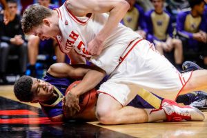 Trent Nelson  |  The Salt Lake Tribune
Washington Huskies forward Marquese Chriss (0) and Utah Utes forward Jakob Poeltl (42) in a scramble as the University of Utah Utes host the Washington Huskies, NCAA basketball at the Huntsman Center in Salt Lake City, Wednesday February 10, 2016.