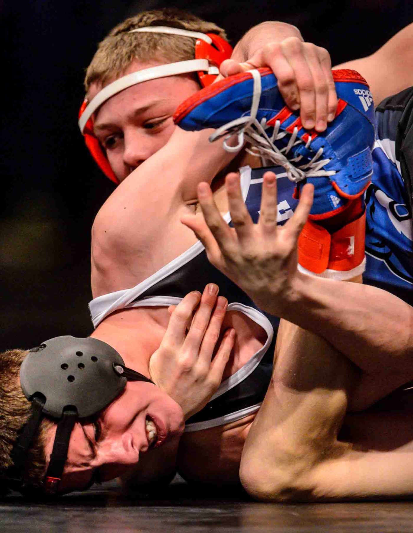 Trent Nelson  |  The Salt Lake Tribune
Hunter Thacker, Altamont (rear) vs. Zackary Julander, Panguitch (front) in the 1A 120 championship match at the Class 3A, 2A and 1A high school wrestling tournament at the UCCU Center in Orem, Saturday February 13, 2016.