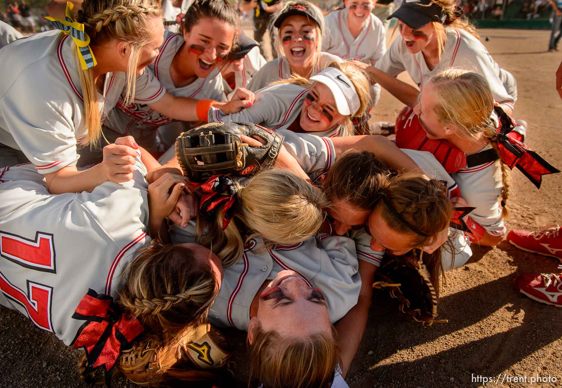 Trent Nelson  |  The Salt Lake Tribune
Spanish Fork players celebrate defeating Maple Mountain in the 4A high school softball championship game, Taylorsville, Thursday May 26, 2016.