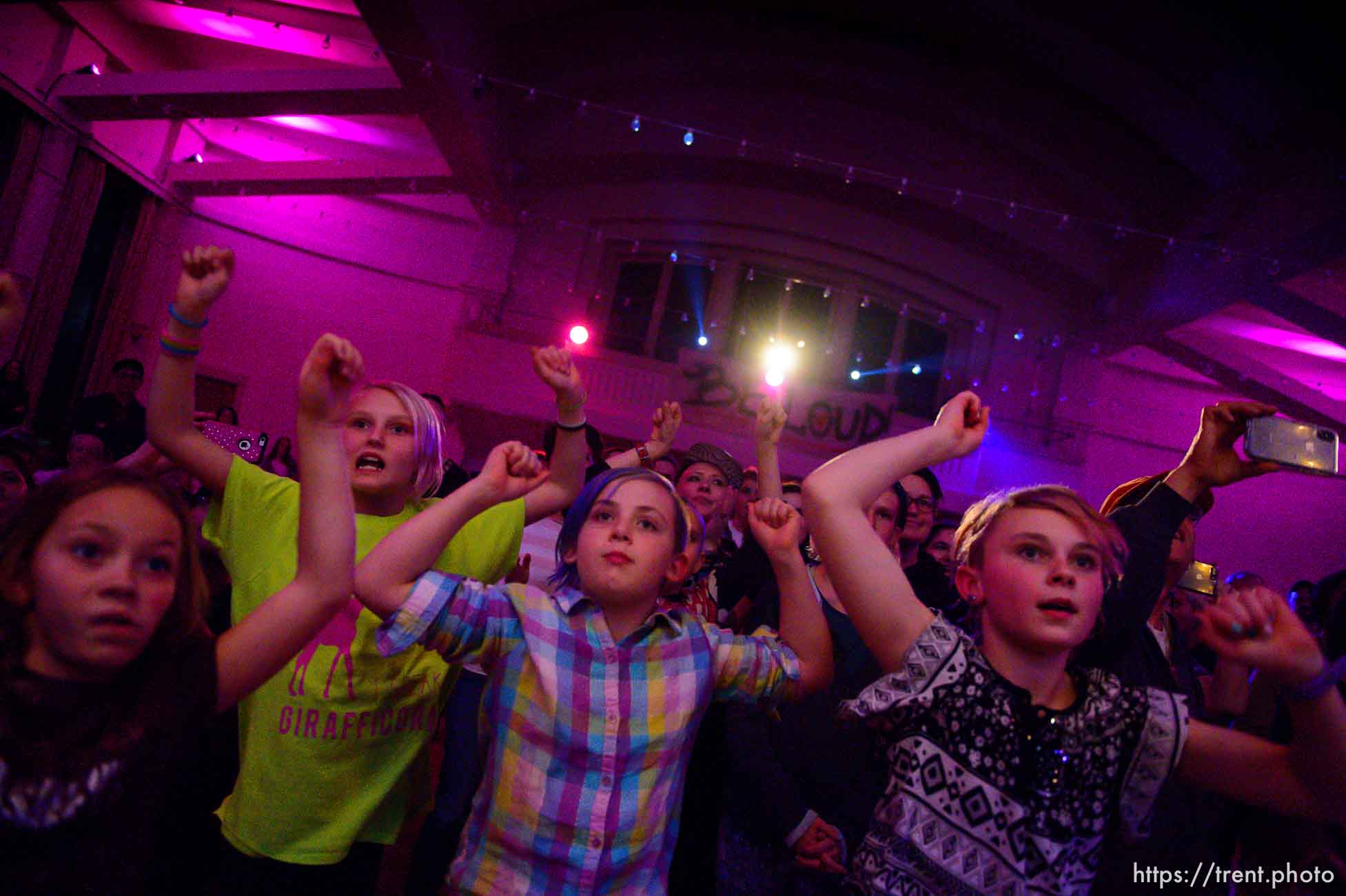 Fans dance to the Bam Bams at Rock Camp for Womyn's showcase, a live performance. People attending the camp learn how to play instruments, form bands, write songs, and perform live in concert — all in three days. It's a new program by the same group that does Rock and Roll Camp for Girls. Salt Lake City, Sunday February 4, 2018.