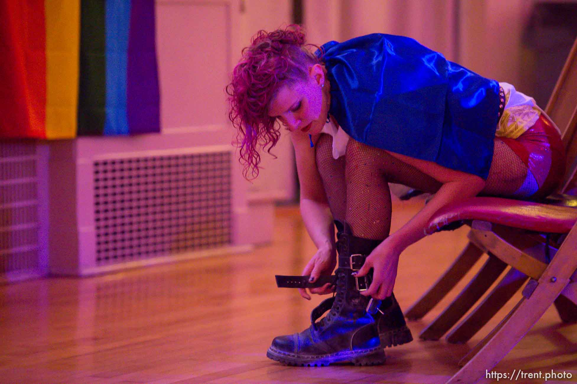 Frieda Hamilton puts on a pair of boots before Rock Camp for Womyn's showcase, a live performance. People attending the camp learn how to play instruments, form bands, write songs, and perform live in concert — all in three days. It's a new program by the same group that does Rock and Roll Camp for Girls. Salt Lake City, Sunday February 4, 2018.