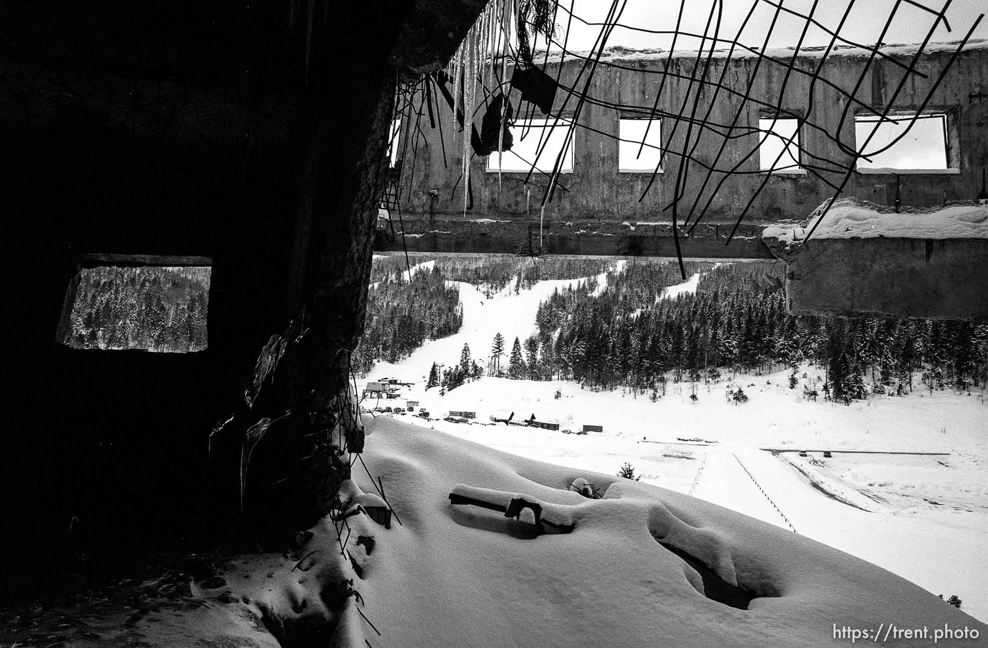 Olympic venue and ski resort at Babindo, seen through bombed-out hotel.