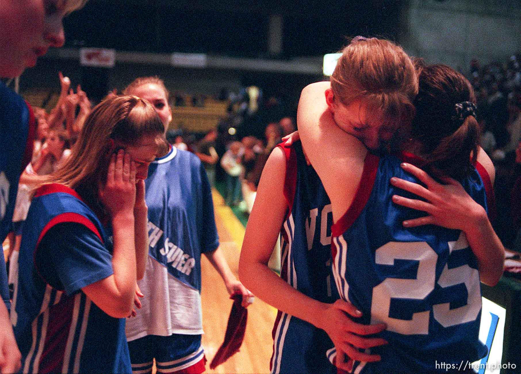 North Sevier basketball players grieve at their loss in the state championship to Beaver. From left, (top left corner) Angie Hawkins, Chasity Peterson, Danielle Andreasen, Angie Braithwaite, Shadoe Shaheen.