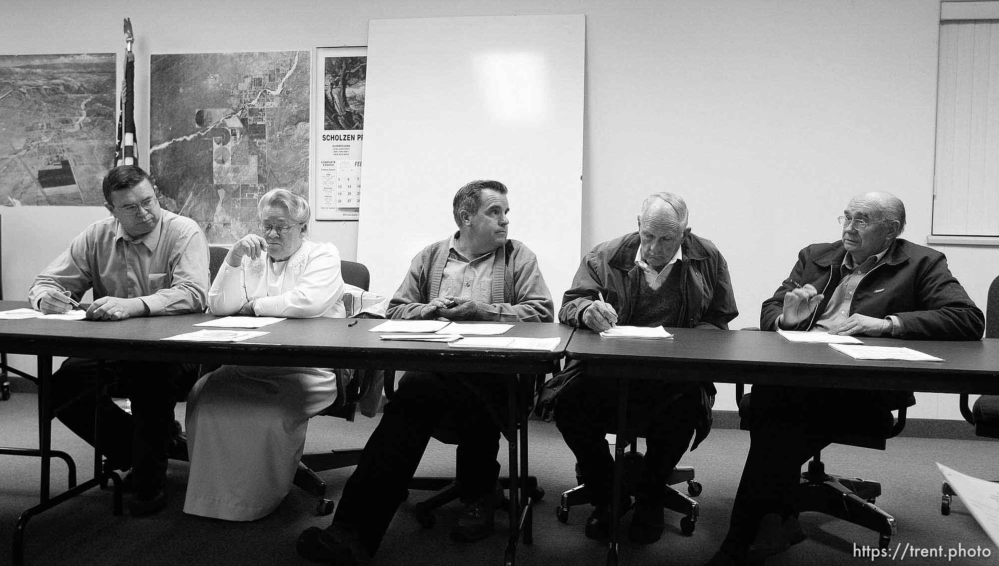 Colorado City Council left to right: Kimball Barlow (gray shirt), Karen Barlow (pink dress), Terrill Johnson, Bygnal Dutson, Floyd Black, Donald Richter.