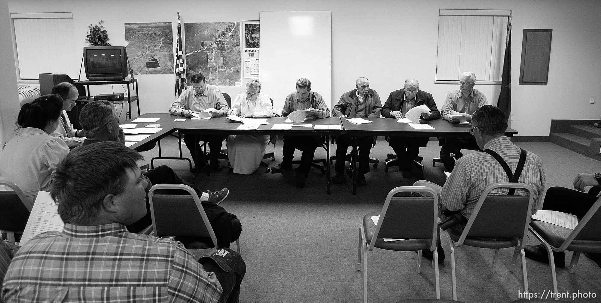 Colorado City Council left to right: Kimball Barlow (gray shirt), Karen Barlow (pink dress), Terrill Johnson, Bygnal Dutson, Floyd Black, Donald Richter.