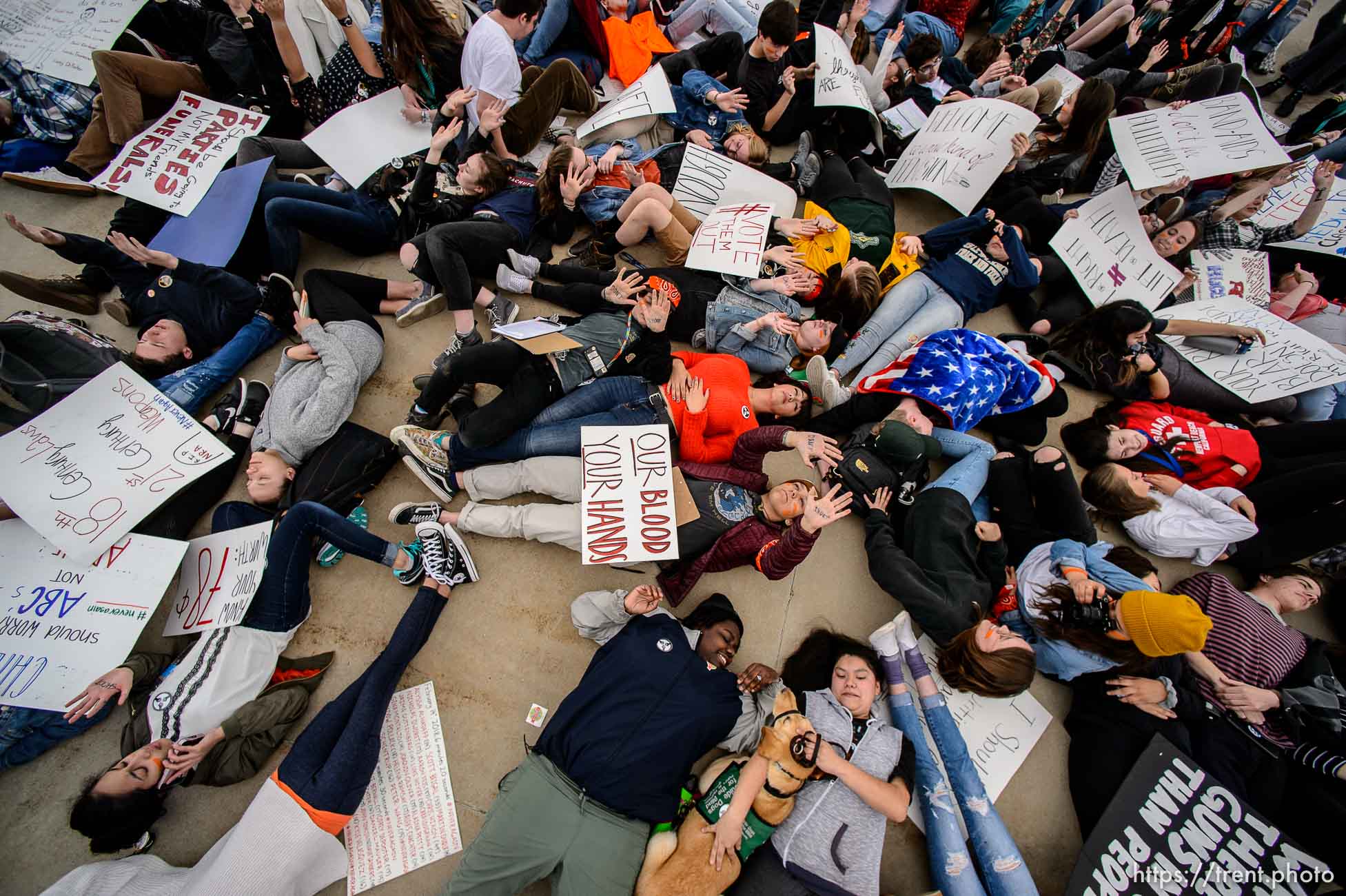 (Trent Nelson | The Salt Lake Tribune)  
High school students staged a die-in at the Utah State Capitol in Salt Lake City to mark the anniversary of the Columbine High School massacre and call for action against gun violence, Friday April 20, 2018.