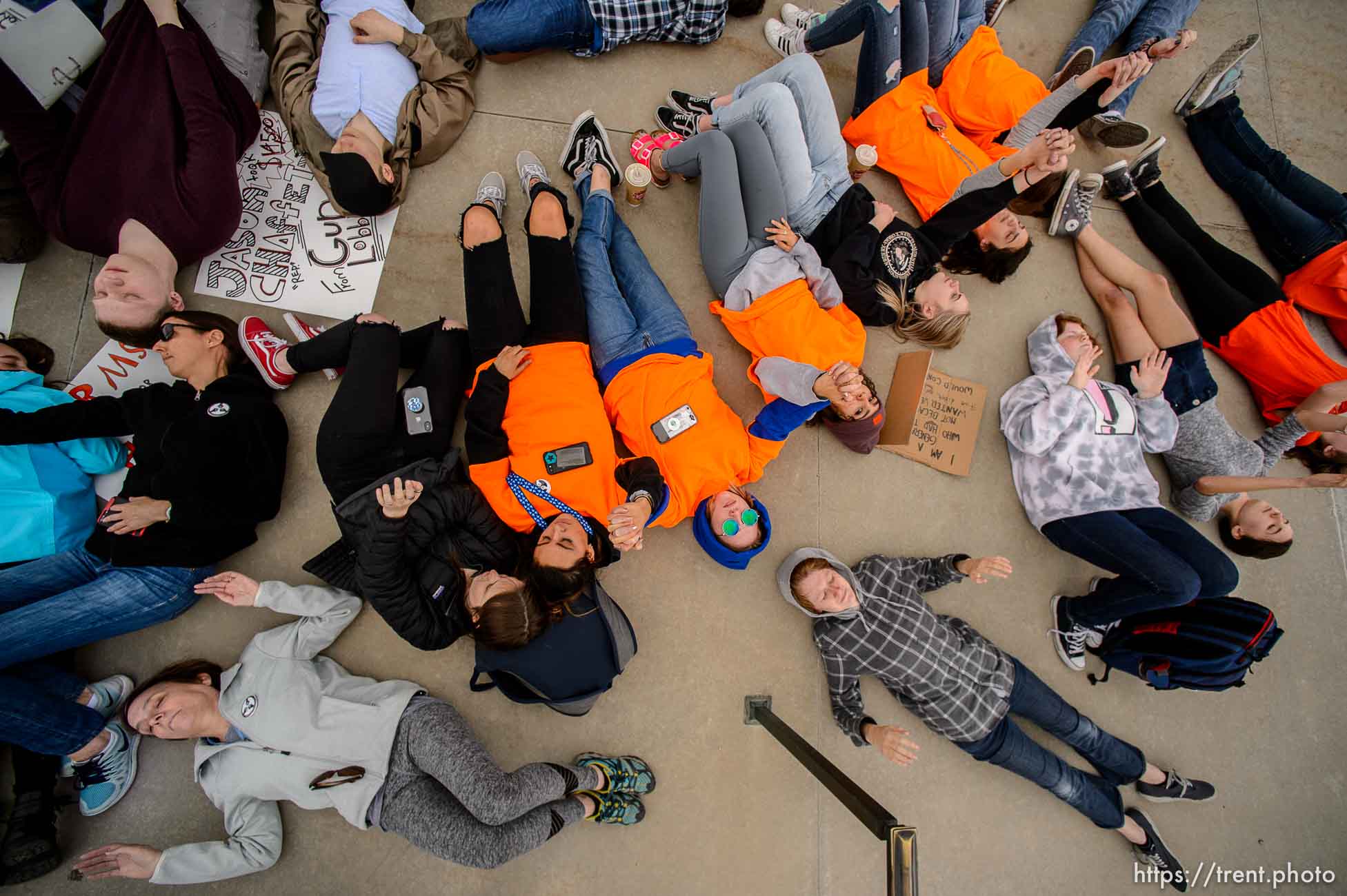 (Trent Nelson | The Salt Lake Tribune)  
High school students staged a die-in at the Utah State Capitol in Salt Lake City to mark the anniversary of the Columbine High School massacre and call for action against gun violence, Friday April 20, 2018.