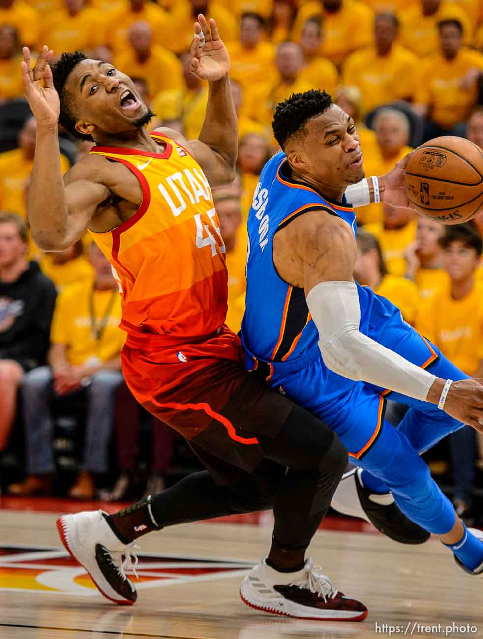 (Trent Nelson | The Salt Lake Tribune)  
Utah Jazz host the Oklahoma City Thunder, Game 3, NBA playoff basketball in Salt Lake City, Saturday April 21, 2018. Utah Jazz guard Donovan Mitchell (45) fouls Oklahoma City Thunder guard Russell Westbrook (0).