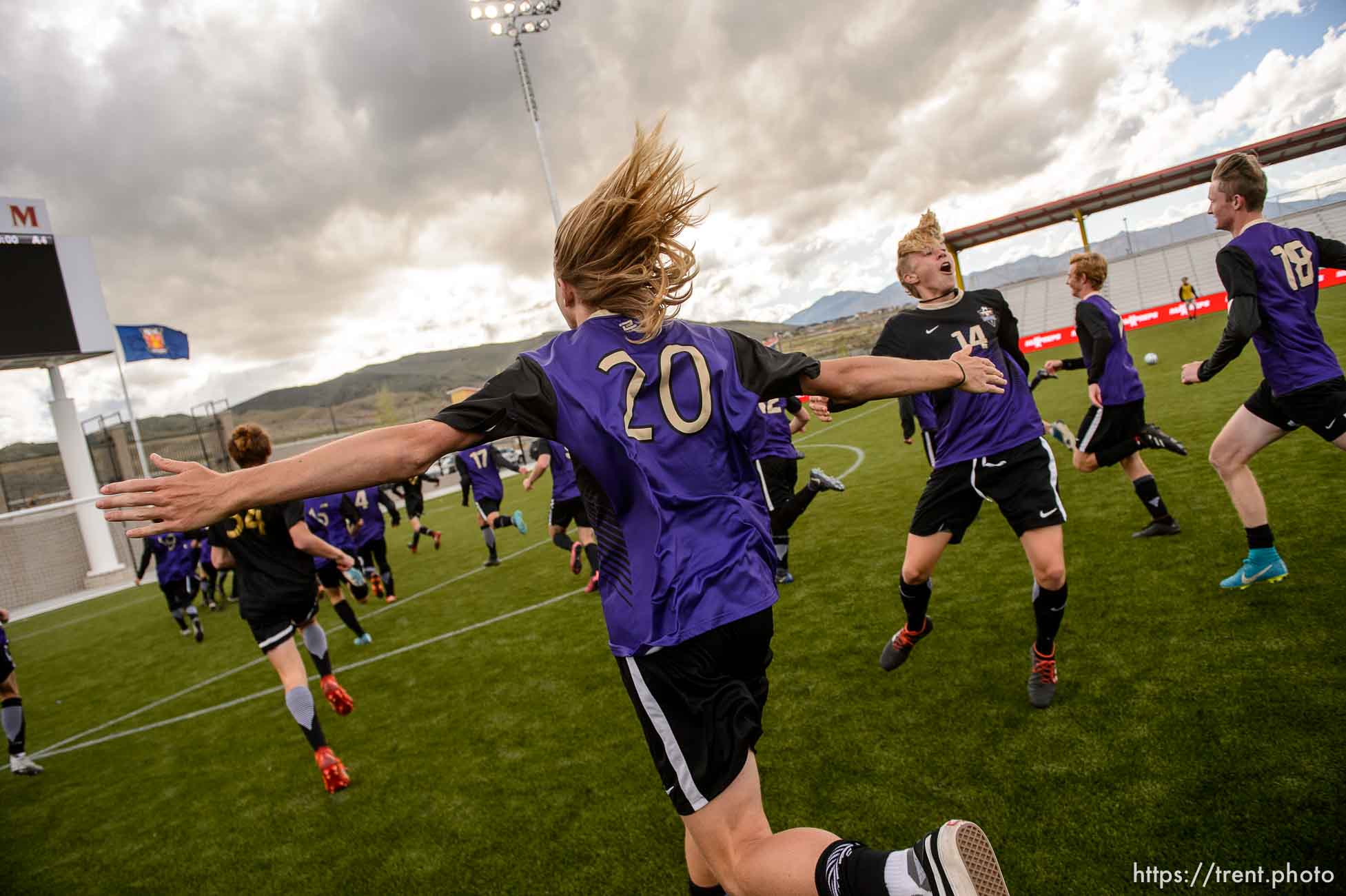 (Trent Nelson | The Salt Lake Tribune)  
Desert Hills players celebrate their win over Park City High School in the 4A state championship game, Saturday May 12, 2018.