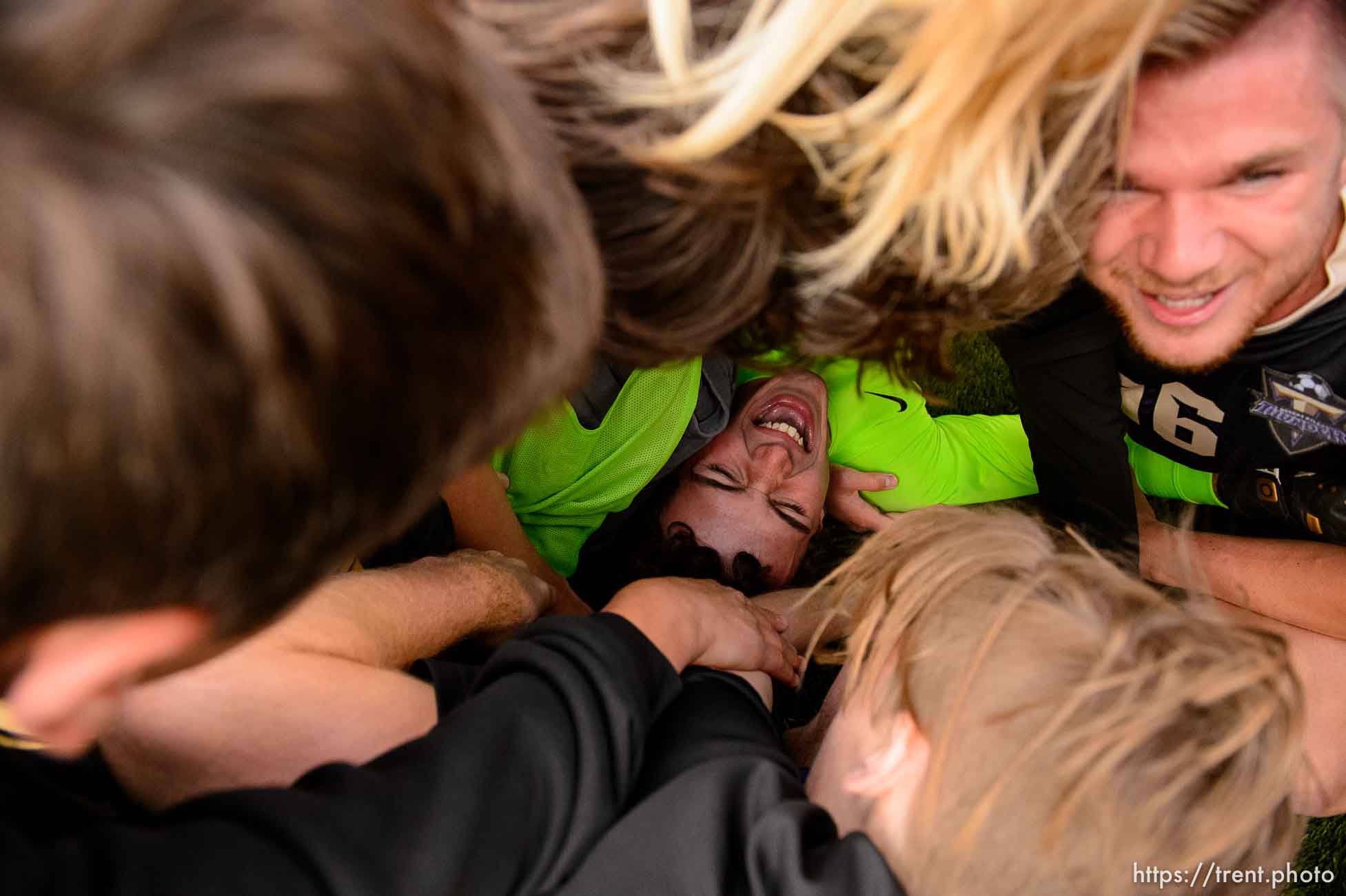 (Trent Nelson | The Salt Lake Tribune)  
Desert Hills players celebrate their win over Park City High School in the 4A state championship game, Saturday May 12, 2018.