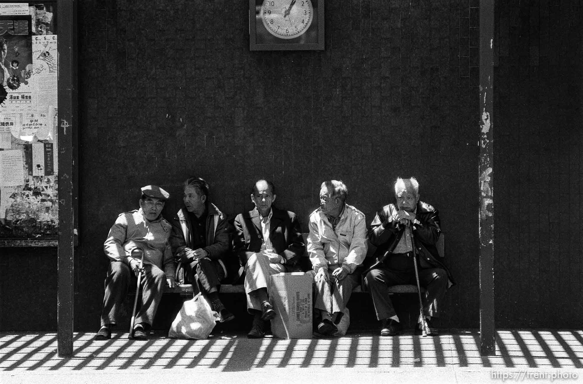 Old men on a bench in Chinatown.