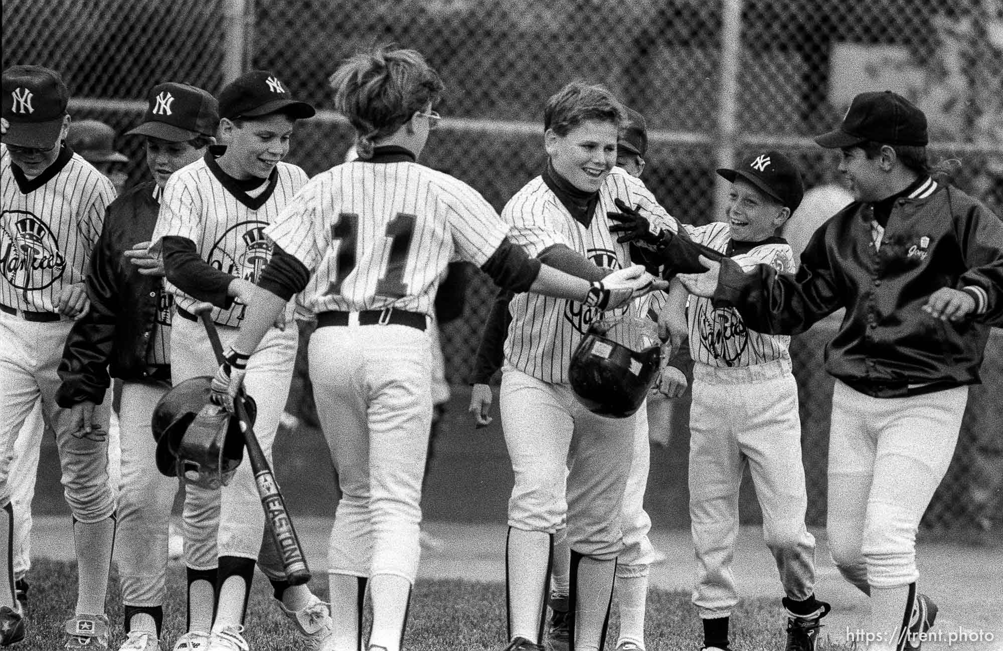 Players congratulate home-run hitter at Yankees game