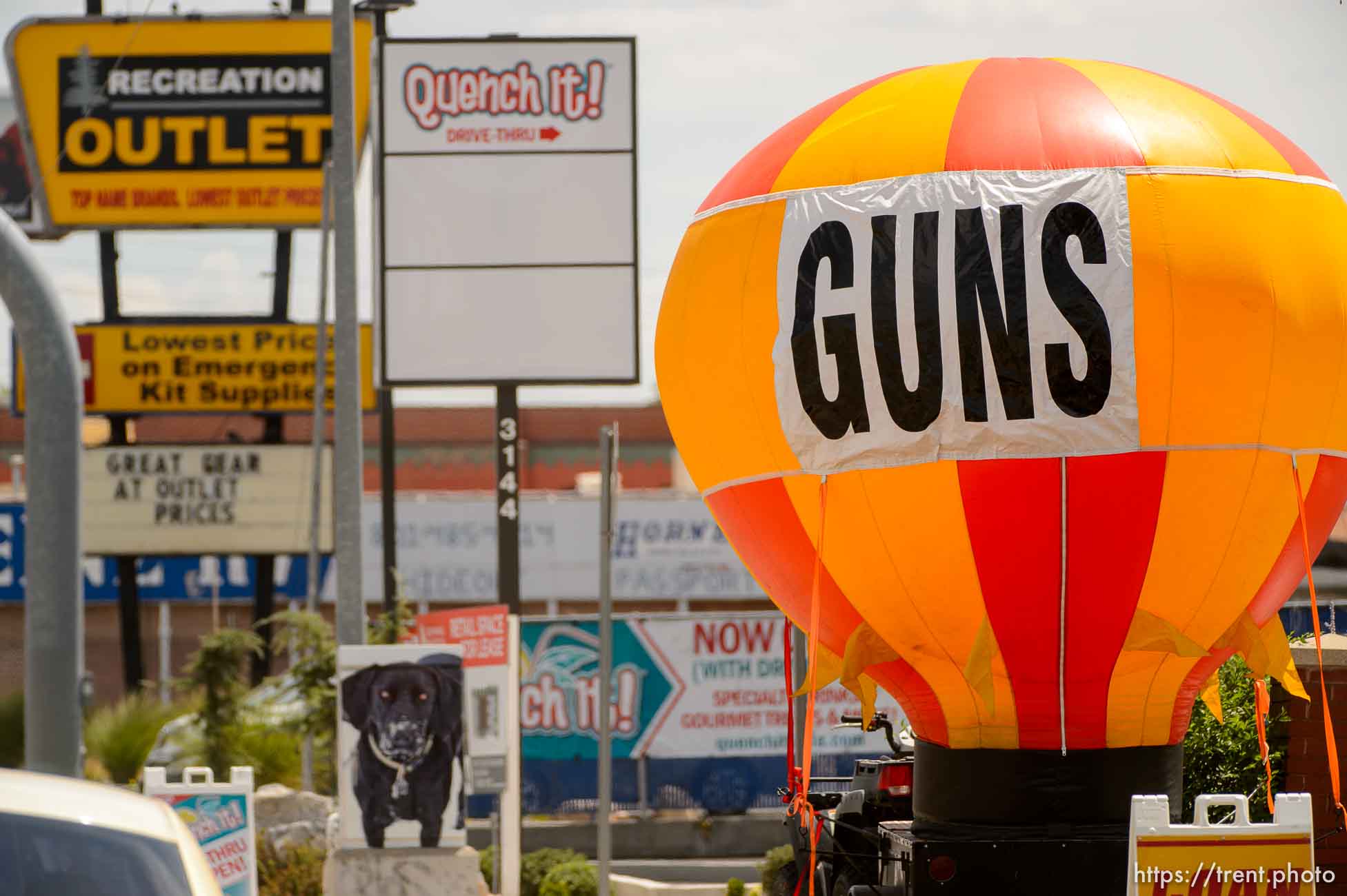 guns sign on balloon, 1st cash pawn shop, state street, slc, Saturday July 21, 2018.