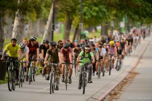 (Trent Nelson | The Salt Lake Tribune)
Cyclists gather and ride around Salt Lake City's Liberty Park, Saturday July 21, 2018, in remembrance of Cameron Hooyer, a rider who was killed by a FrontRunner train during a 999 Ride on Thursday.