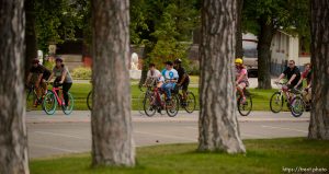 (Trent Nelson | The Salt Lake Tribune)
Cyclists gather and ride around Salt Lake City's Liberty Park, Saturday July 21, 2018, in remembrance of Cameron Hooyer, a rider who was killed by a FrontRunner train during a 999 Ride on Thursday.