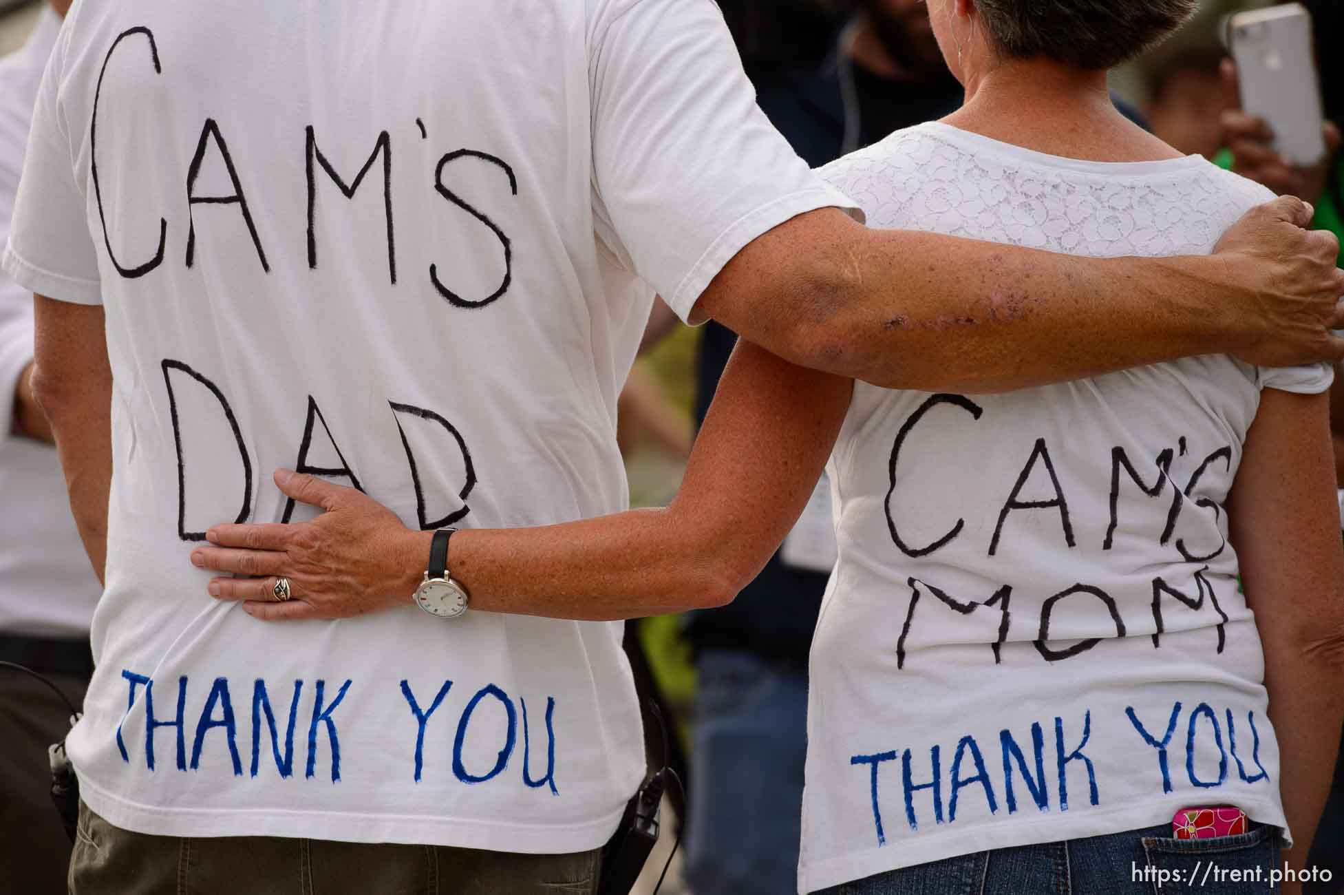 (Trent Nelson | The Salt Lake Tribune)
Cyclists gather and ride around Salt Lake City's Liberty Park, Saturday July 21, 2018, in remembrance of Cameron Hooyer, a rider who was killed by a FrontRunner train during a 999 Ride on Thursday. Hooyer's parents Mark and Carla Hooyer.