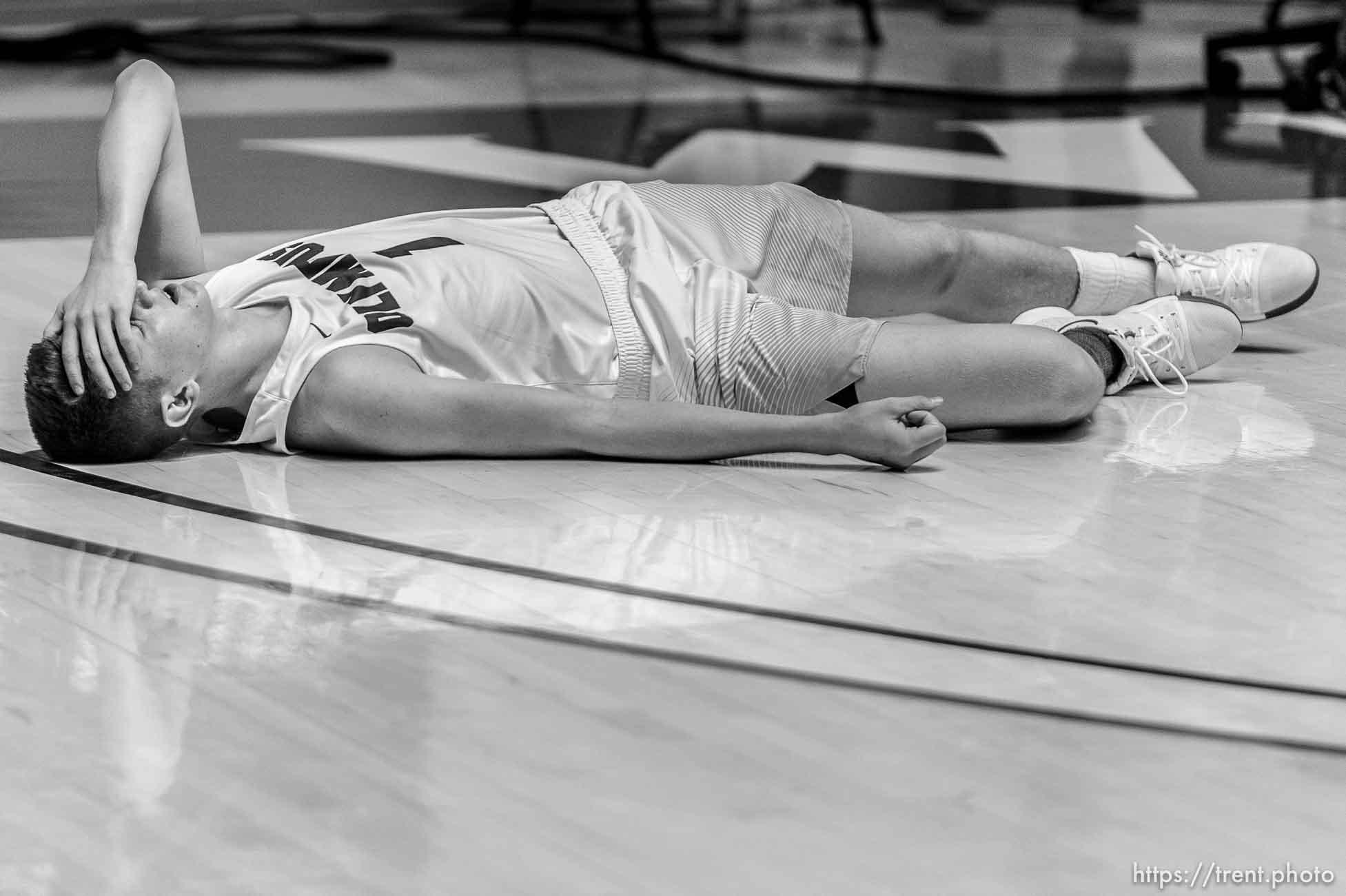 Trent Nelson  |  The Salt Lake Tribune
Olympus's Travis Wagstaff (1) on the floor as Springville defeats Olympus in overtime in the 4A state high school basketball championship game, Saturday March 4, 2017.