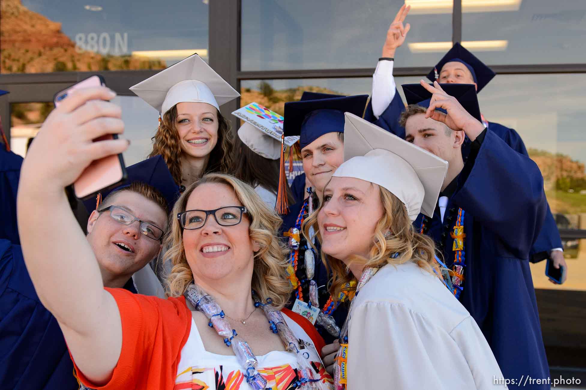 Trent Nelson  |  The Salt Lake Tribune
Teacher Jessica Hammett takes a selfie with graduates at Water Canyon High School's graduation ceremony in Hildale, Monday May 22, 2017. Two years ago the school had one graduate, this year twenty-five.