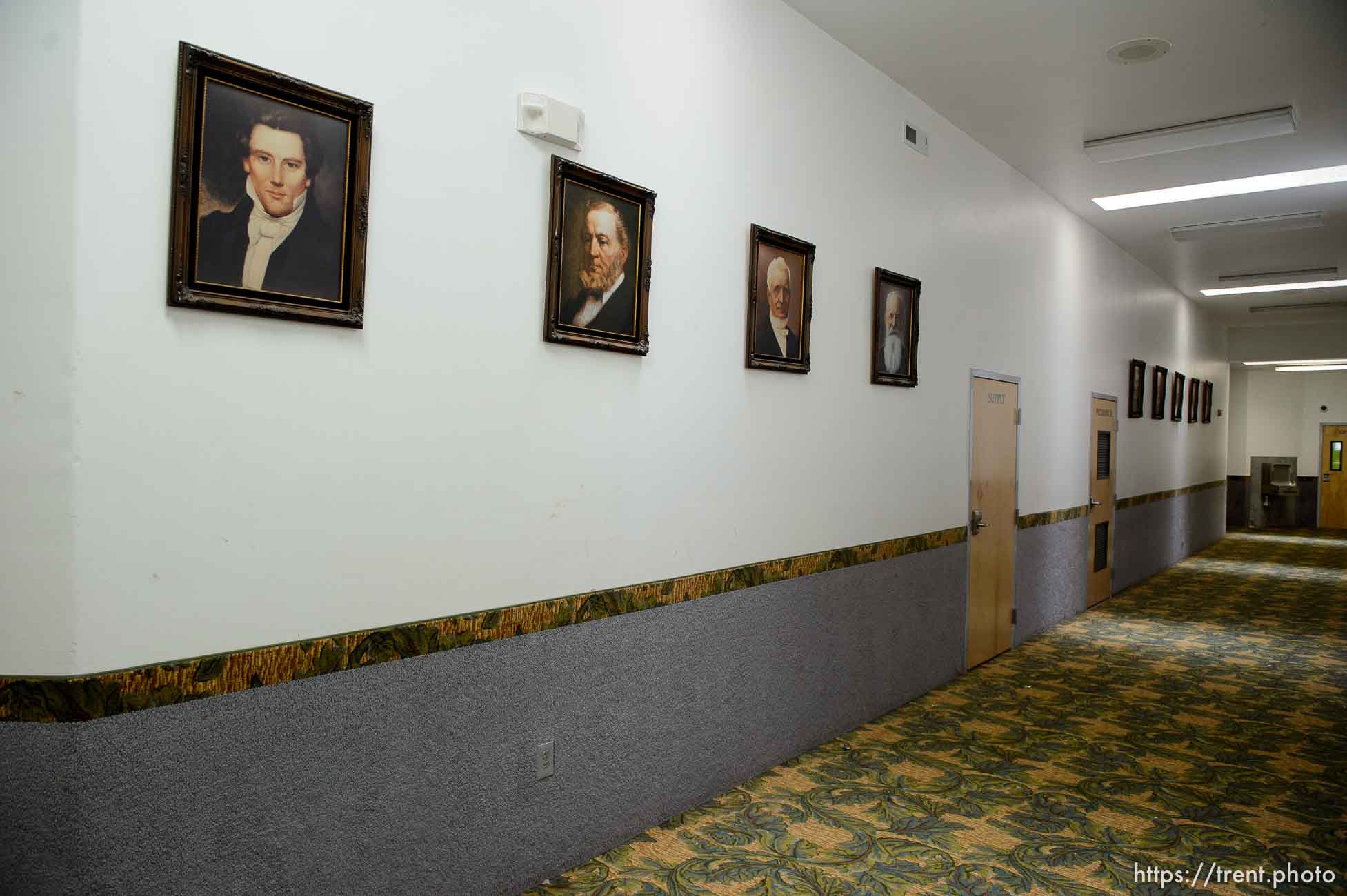 Trent Nelson  |  The Salt Lake Tribune
Portraits of Mormon prophets including Joseph Smith and Brigham Young line the hallway in an FLDS school in Colorado City, Ariz., one of a few sites being considered for use as an LDS meetinghouse. The property is owned by the UEP land trust, which is seeking to dispose of its holdings. Tuesday May 23, 2017.