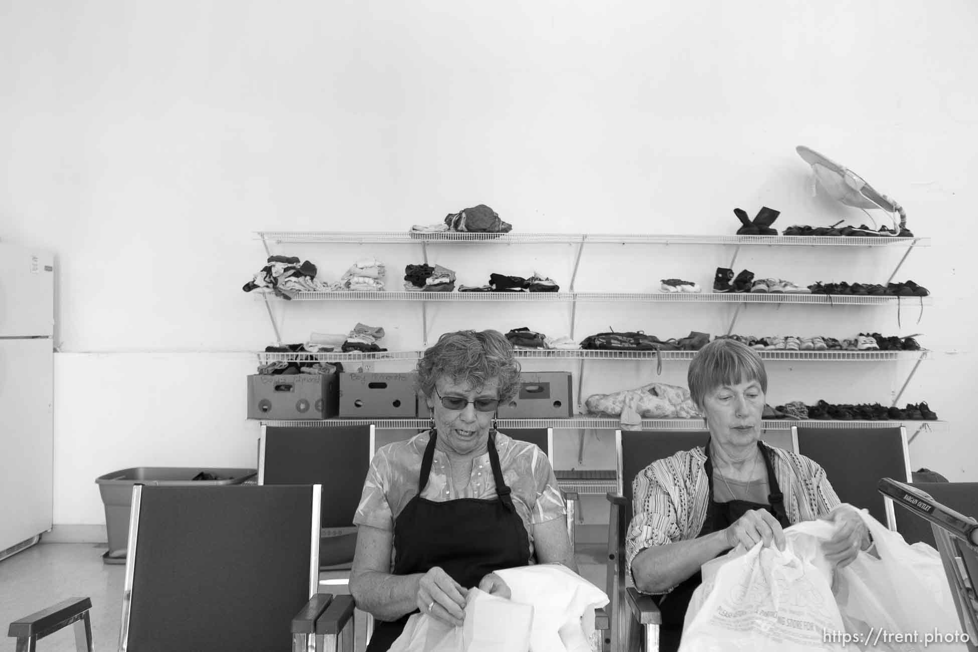 Trent Nelson  |  The Salt Lake Tribune
Volunteers Sharon Collins and Raylaine Morse. Short Creek Family Services Center provides food and services to families, Wednesday September 14, 2016.