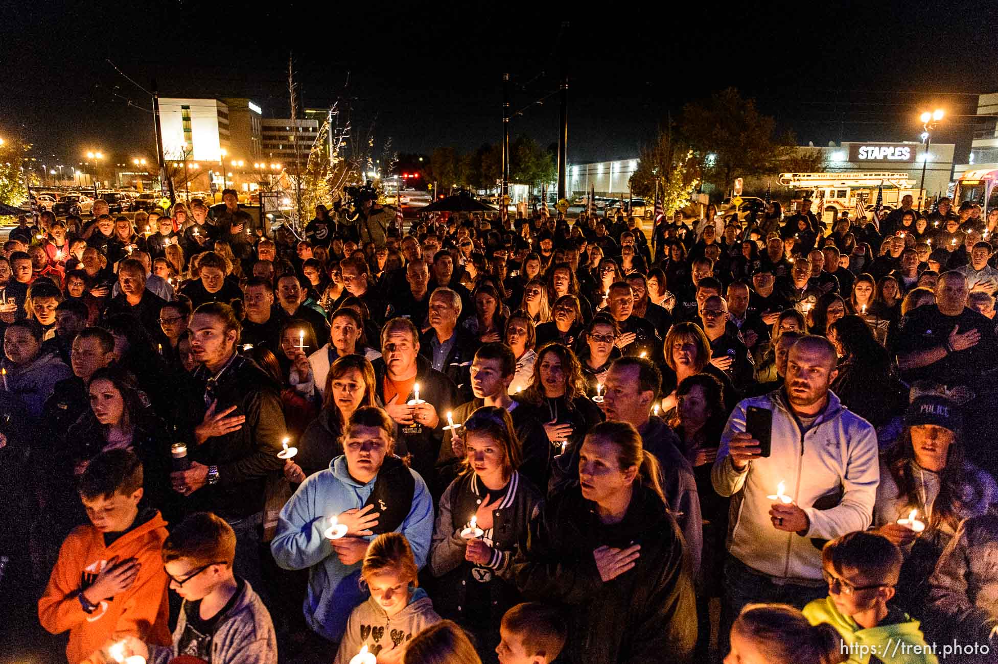 Trent Nelson  |  The Salt Lake Tribune
A large crowd at a candlelight vigil to honor West Valley City police officer Cody Brotherson, who was killed Sunday while apparently trying to lay down tire spikes to stop a fleeing stolen car. Wednesday November 9, 2016.