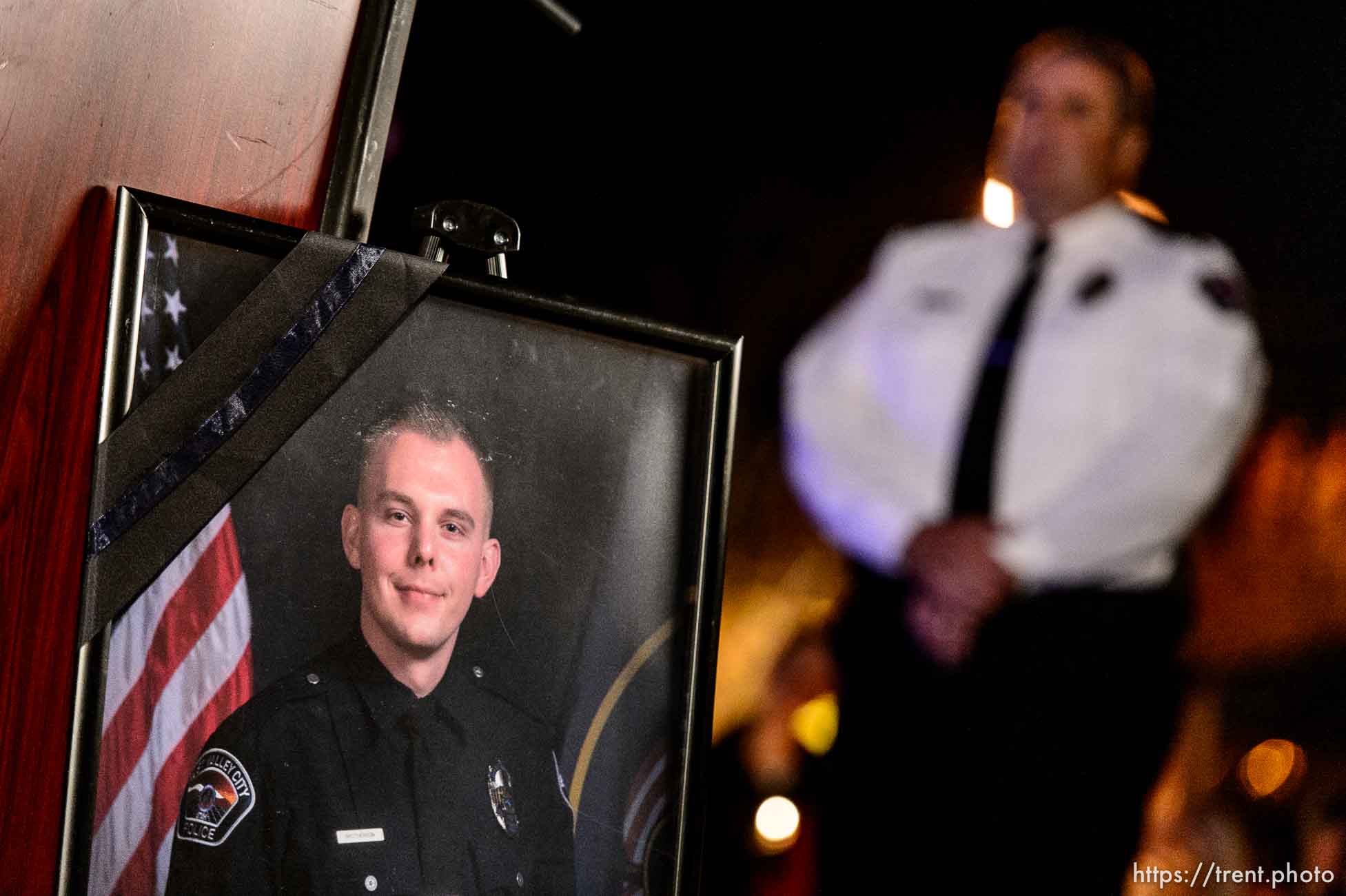 Trent Nelson  |  The Salt Lake Tribune
West Valley City Police Chief Lee Russo stands near a portrait of West Valley City police officer Cody Brotherson, who was killed Sunday while apparently trying to lay down tire spikes to stop a fleeing stolen car. At  at a candlelight vigil, Wednesday November 9, 2016.