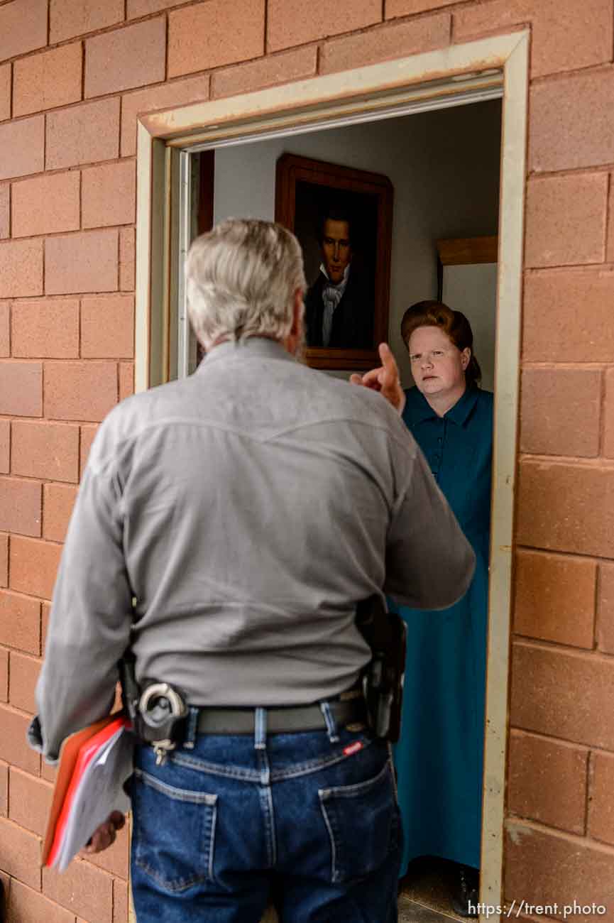 Trent Nelson  |  The Salt Lake Tribune
FLDS member Julia Johnson confronts Mohave County Constable Mike Hoggard, disputing the UEP Trust's ability to evict her from a property in Colorado City, AZ, Tuesday May 9, 2017.