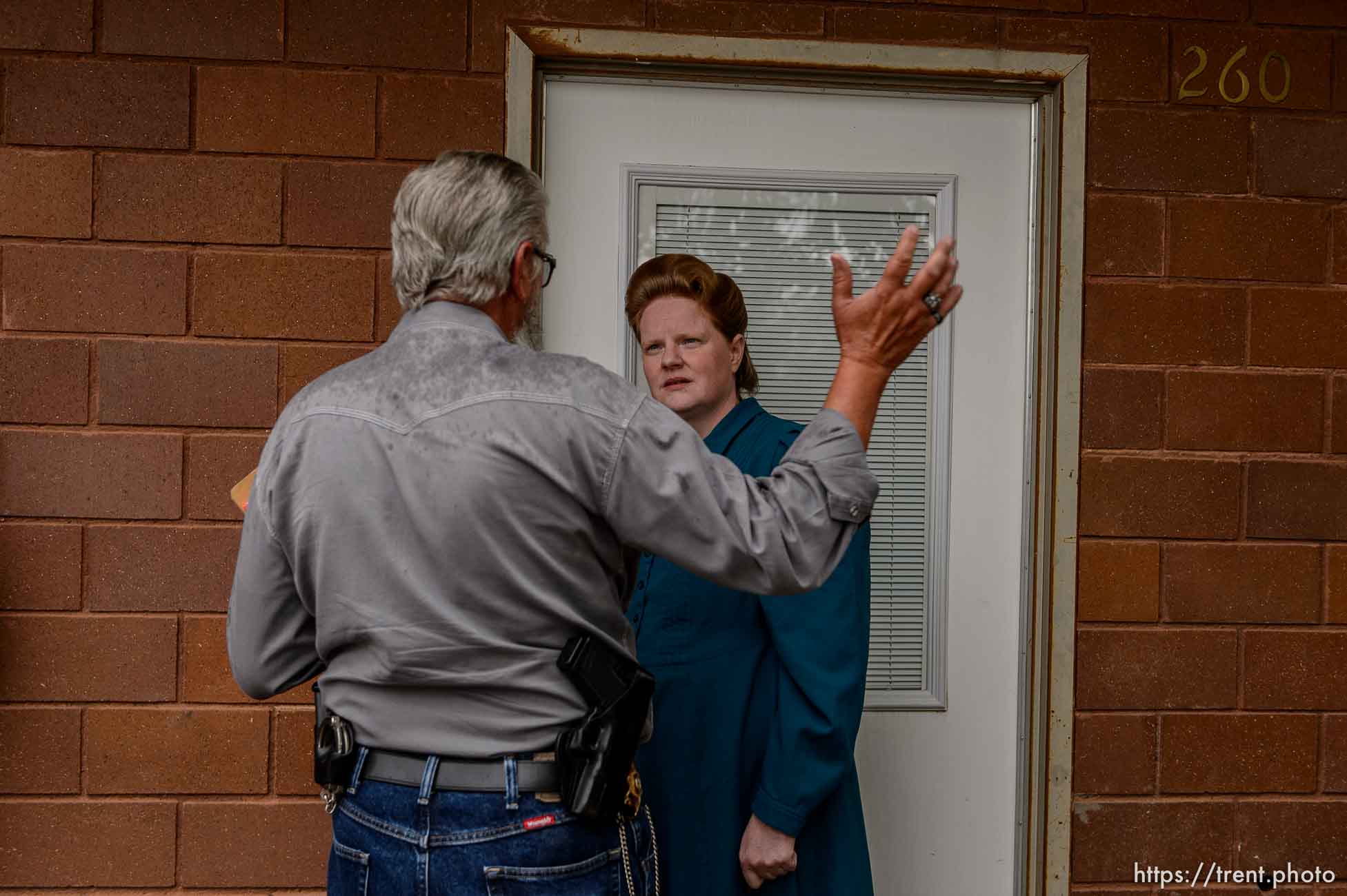 Trent Nelson  |  The Salt Lake Tribune
FLDS member Julia Johnson confronts Mohave County Constable Mike Hoggard, disputing the UEP Trust's ability to evict her from a property in Colorado City, AZ, Tuesday May 9, 2017.