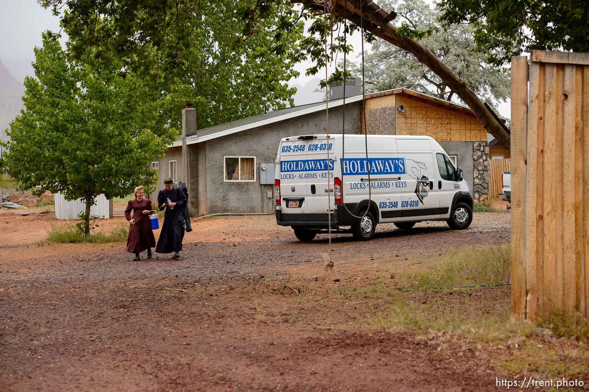 Trent Nelson  |  The Salt Lake Tribune
Two FLDS women are evicted from a home in Colorado City, AZ, Tuesday May 9, 2017, and walk off in the rain.