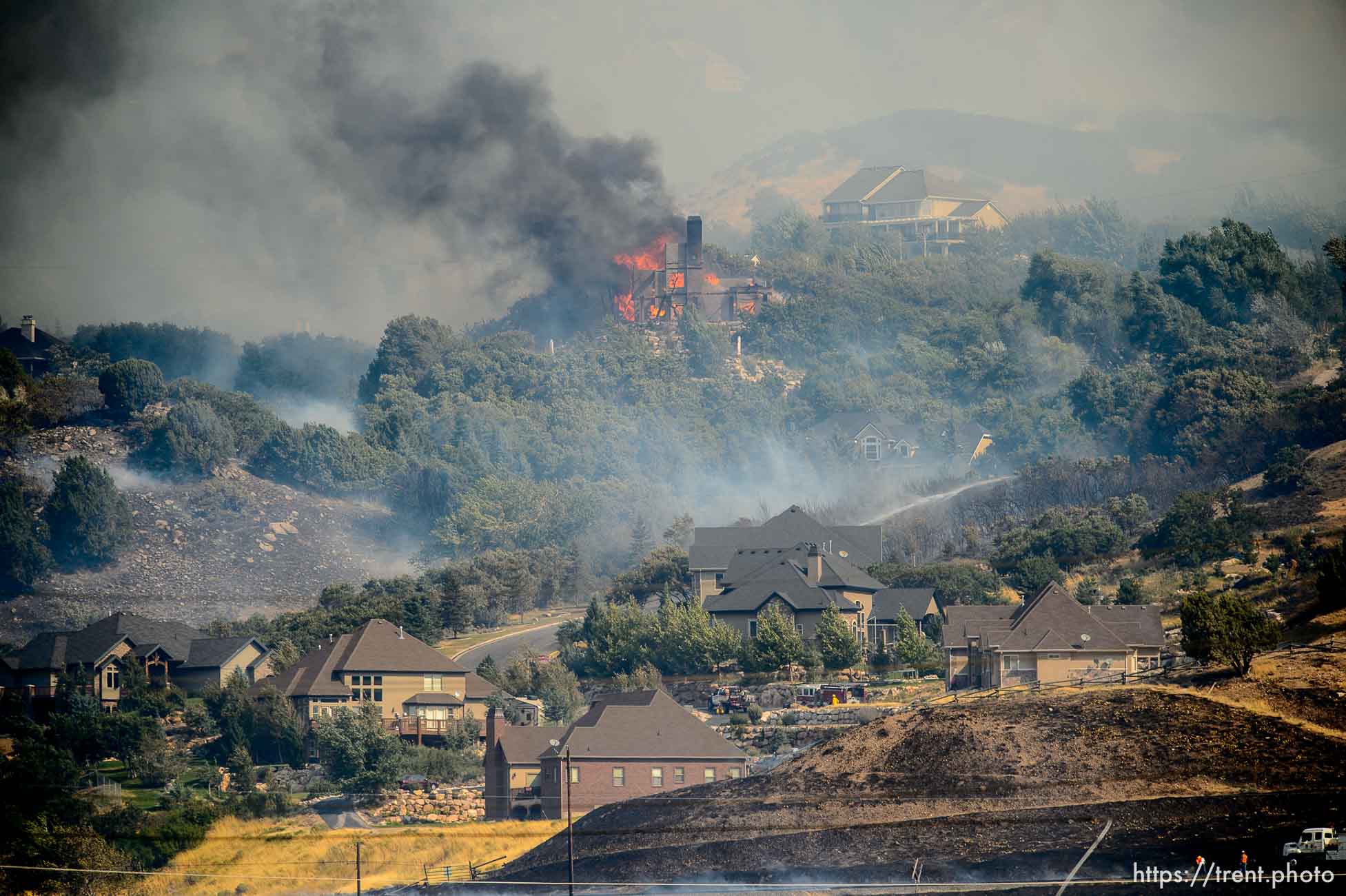 (Trent Nelson | The Salt Lake Tribune)  A home burns in Uintah Highlands at the mouth of Weber Canyon, Tuesday September 5, 2017.