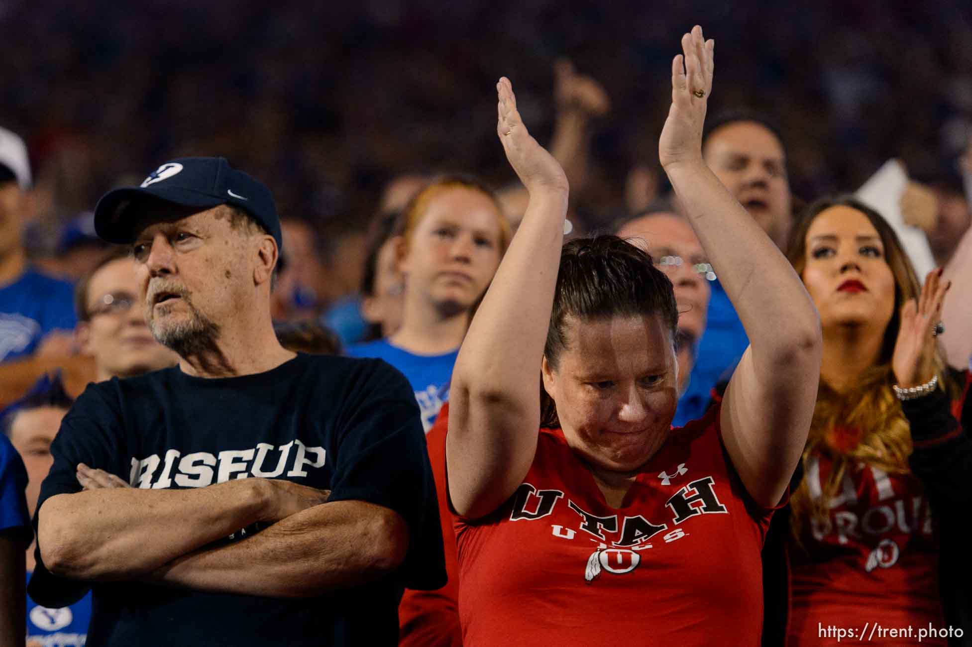 (Trent Nelson | The Salt Lake Tribune)  Fans react to a call going in Utah's favor as BYU hosts Utah, NCAA football in Provo, Saturday September 9, 2017.