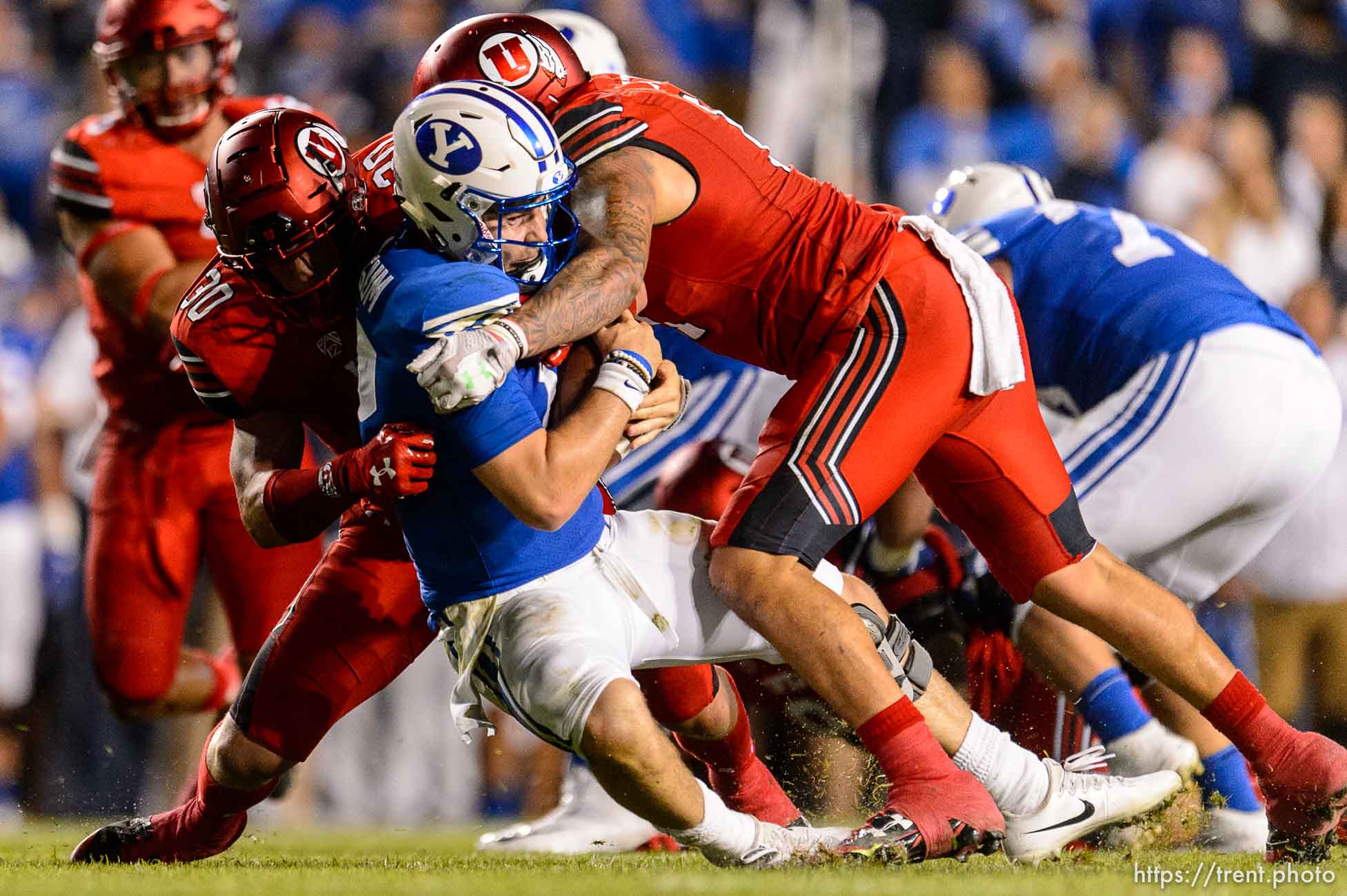 (Trent Nelson | The Salt Lake Tribune)  Utah Utes linebacker Cody Barton (30) sacks Brigham Young Cougars quarterback Tanner Mangum (12) as BYU hosts Utah, NCAA football in Provo, Saturday September 9, 2017.