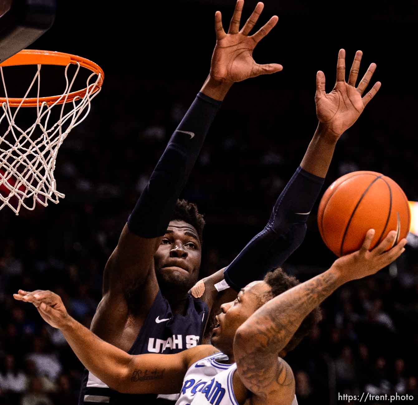 (Trent Nelson | The Salt Lake Tribune)  
Brigham Young Cougars guard Jahshire Hardnett (0) shoots with Utah State Aggies center Neemias Queta (23) defending as BYU hosts Utah State, NCAA basketball in Provo on Wednesday Dec. 5, 2018.