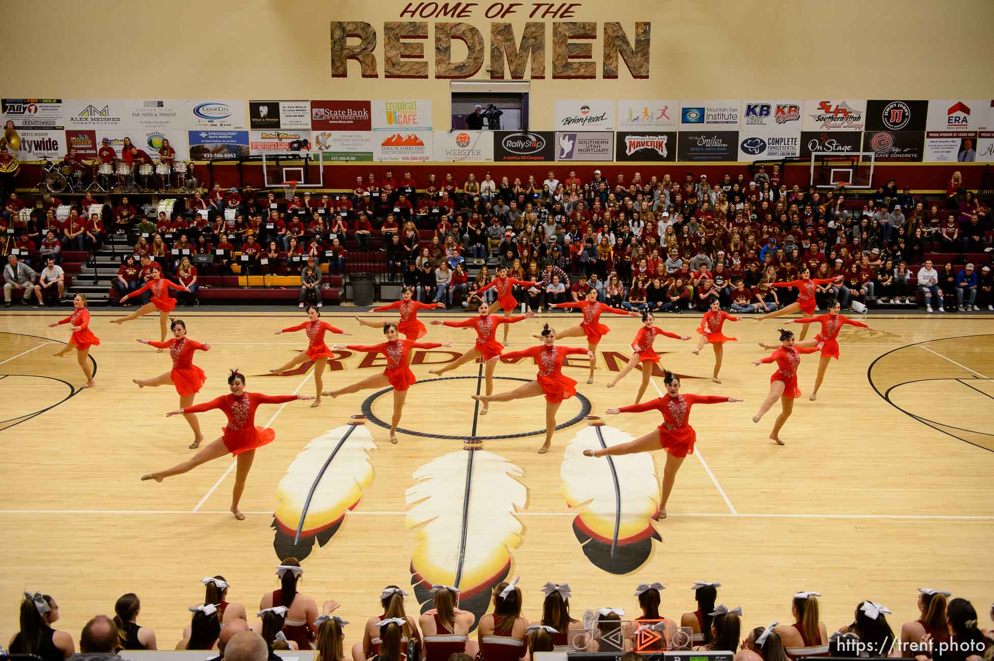 (Trent Nelson | The Salt Lake Tribune)  
Mohey Tawa, the Cedar High drill team, performs at halftime of a basketball game vs. Canyon View.