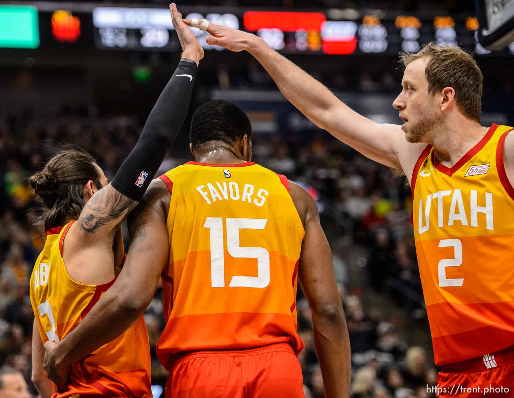 (Trent Nelson | The Salt Lake Tribune)  
Utah Jazz guard Ricky Rubio (3) and Utah Jazz forward Joe Ingles (2) high-five over Utah Jazz forward Derrick Favors (15) as the Utah Jazz host the San Antonio Spurs, NBA basketball in Salt Lake City on Saturday Feb. 9, 2019.