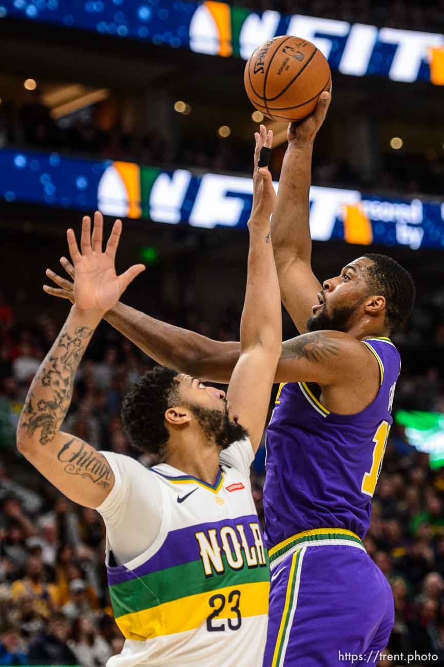 (Trent Nelson | The Salt Lake Tribune)  
Utah Jazz forward Derrick Favors (15) shoots over New Orleans Pelicans forward Anthony Davis (23) as the Utah Jazz host the New Orleans Pelicans, NBA basketball in Salt Lake City on Monday March 4, 2019.