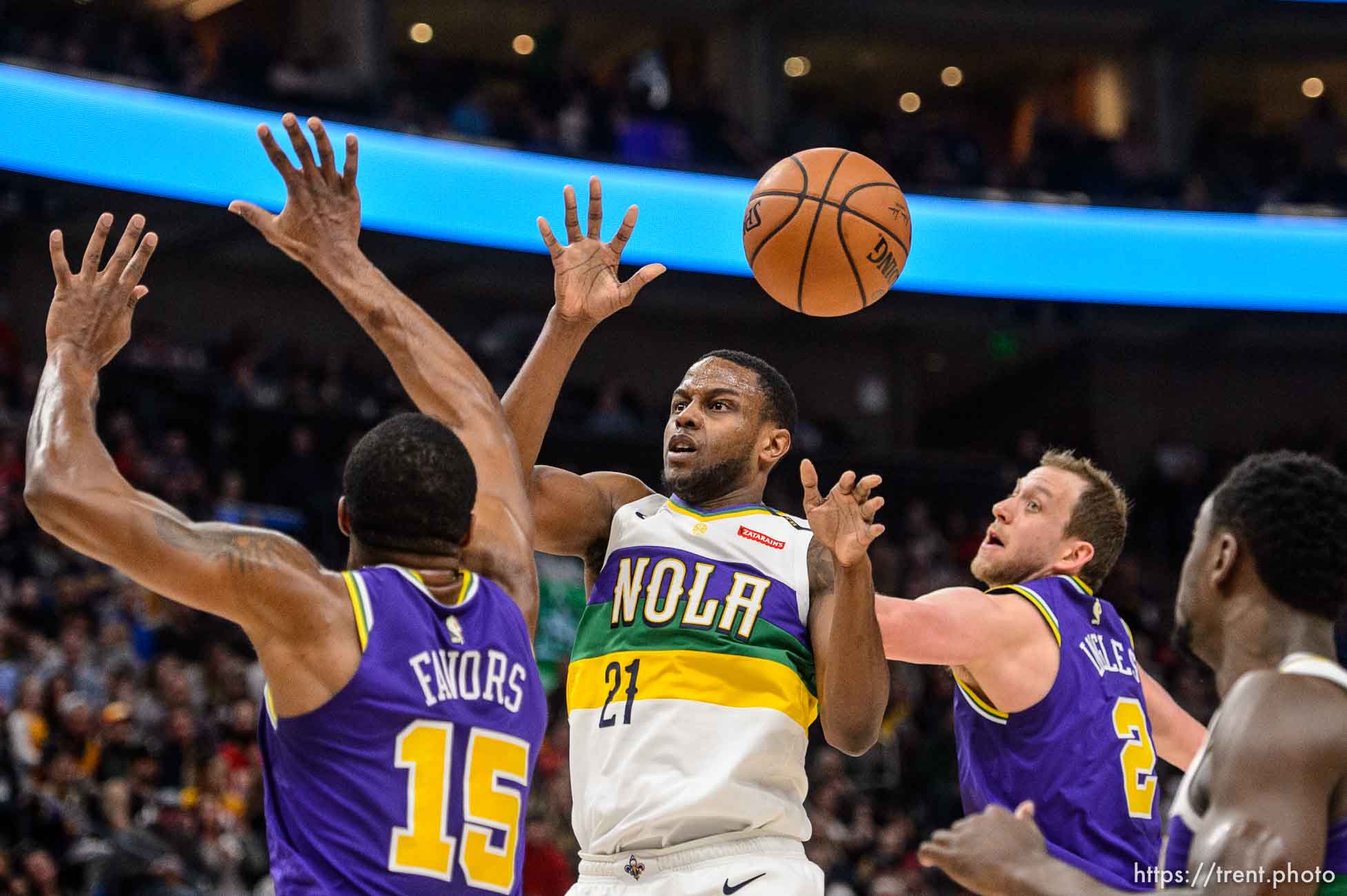 (Trent Nelson | The Salt Lake Tribune)  
New Orleans Pelicans forward Darius Miller (21) defended by Utah Jazz forward Derrick Favors (15) and Utah Jazz forward Joe Ingles (2) as the Utah Jazz host the New Orleans Pelicans, NBA basketball in Salt Lake City on Monday March 4, 2019.