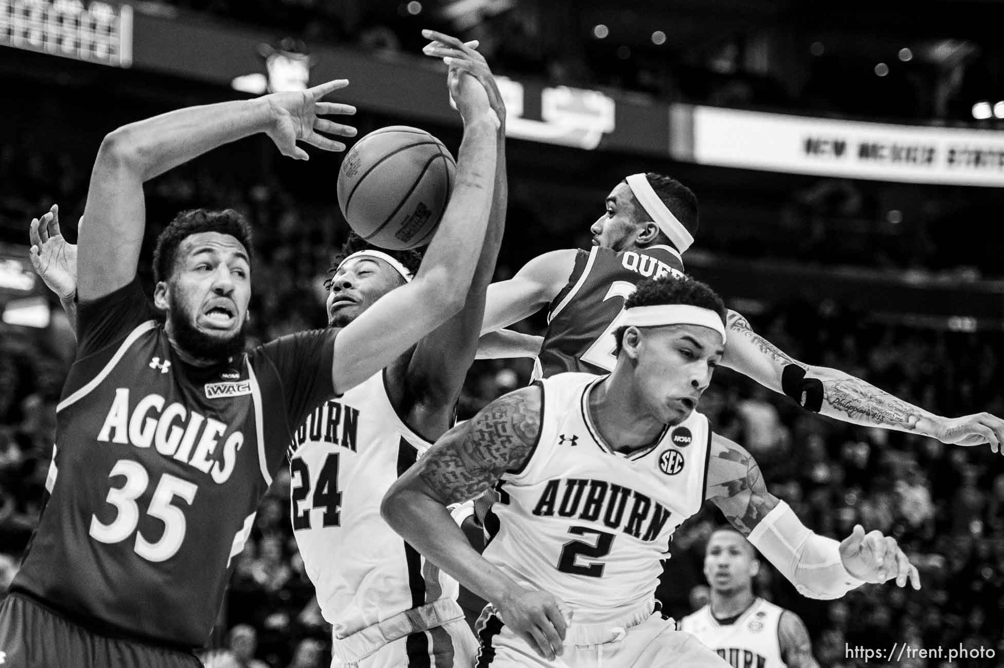 (Trent Nelson | The Salt Lake Tribune)  
New Mexico State Aggies forward Johnny McCants (35), Auburn Tigers forward Anfernee McLemore (24), Auburn Tigers guard Bryce Brown (2) and New Mexico State Aggies guard Trevelin Queen (20) as Auburn faces New Mexico State in the 2019 NCAA Tournament in Salt Lake City on Thursday March 21, 2019.