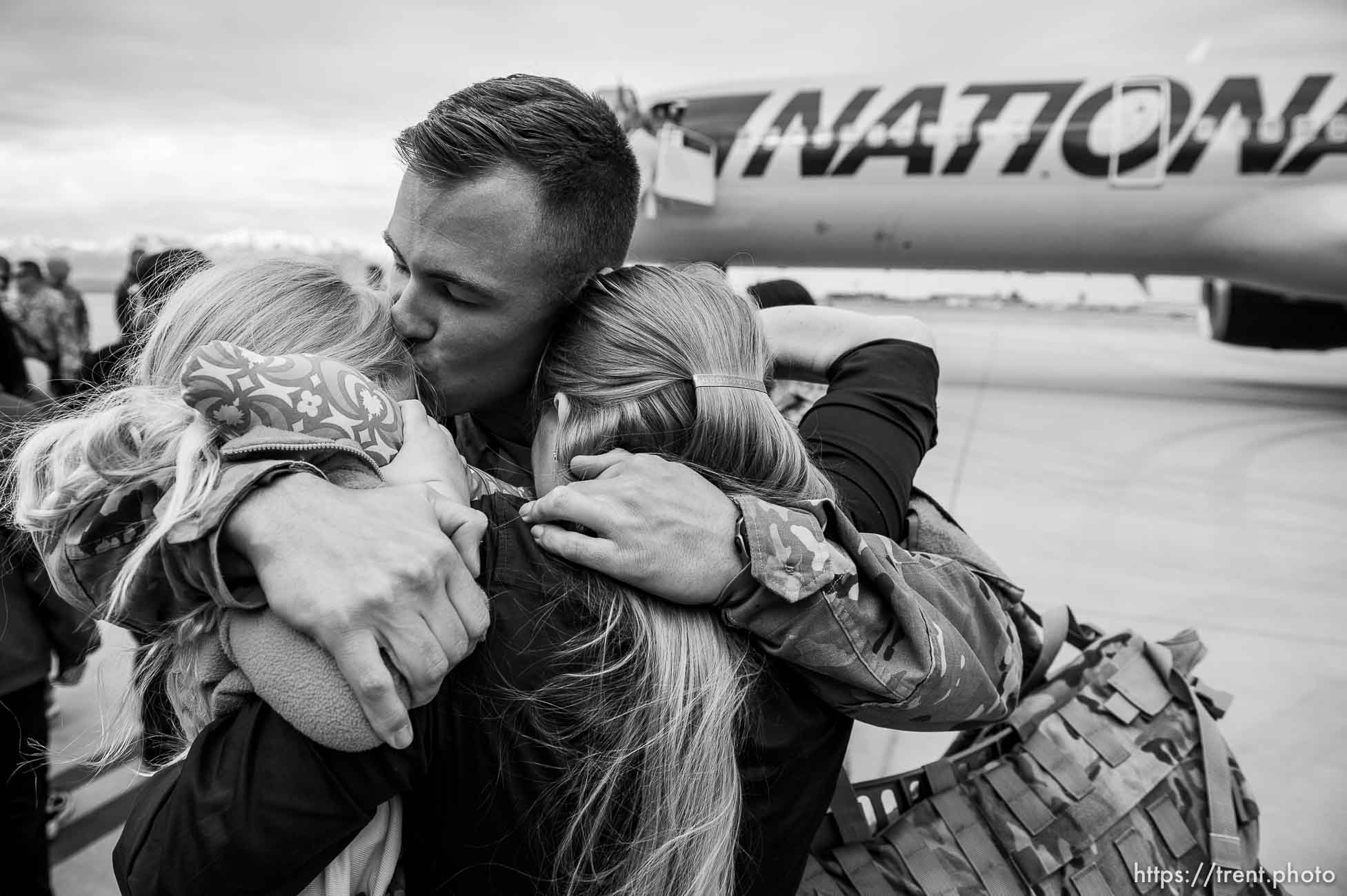 (Trent Nelson  |  The Salt Lake Tribune)  
Sergeant Chris Jackson is welcomed home by his wife Kalee and daughter Emma as almost 100 Soldiers from Utah Army National Guard’s Echo Battery, 1st Battalion, 145th Field Artillery, “Big Red” return after a 10-month Middle East deployment, on Tuesday April 9, 2019 at Wright Air Base in Salt Lake City.