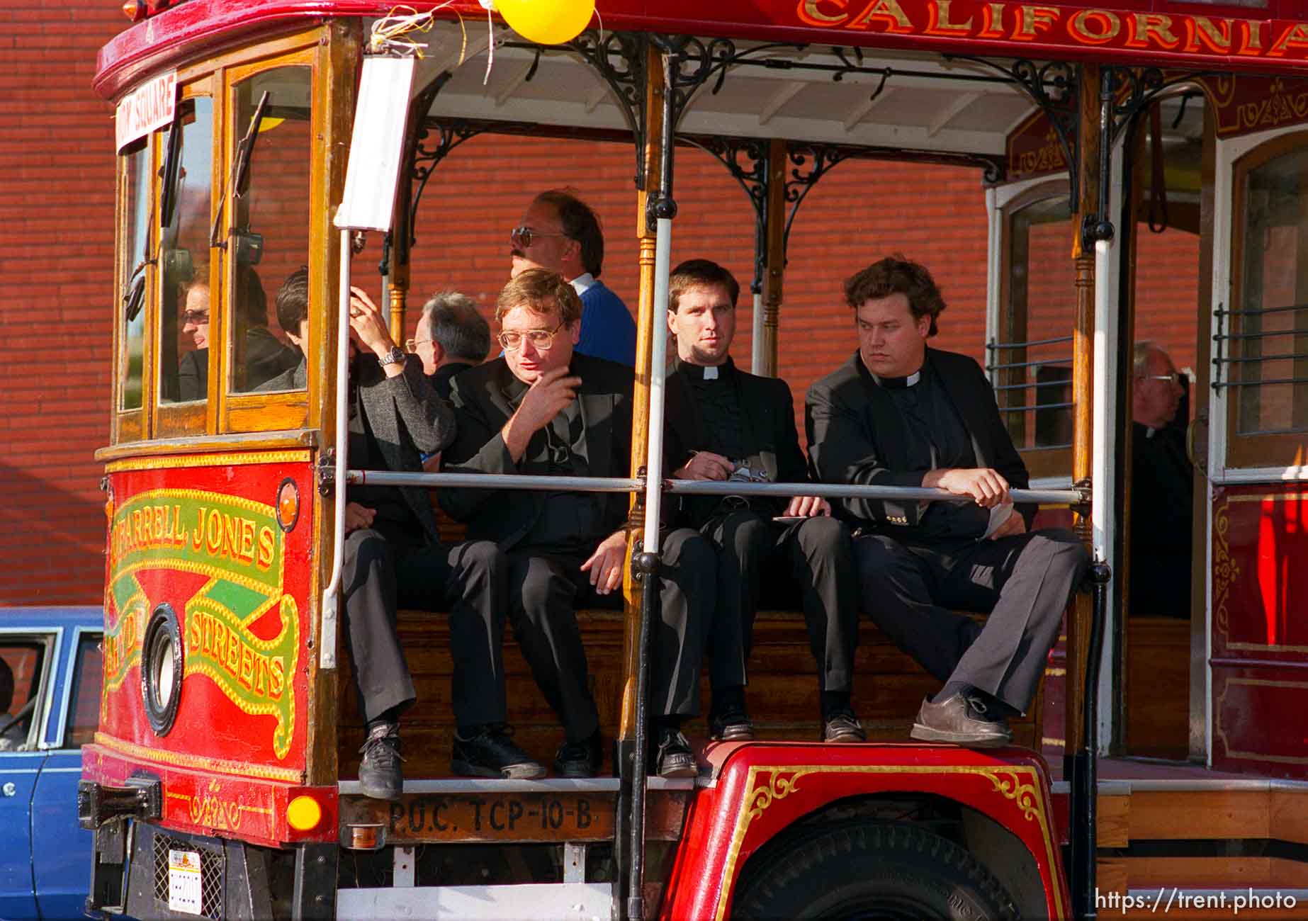 Priests on trolley at the Pope's visit.