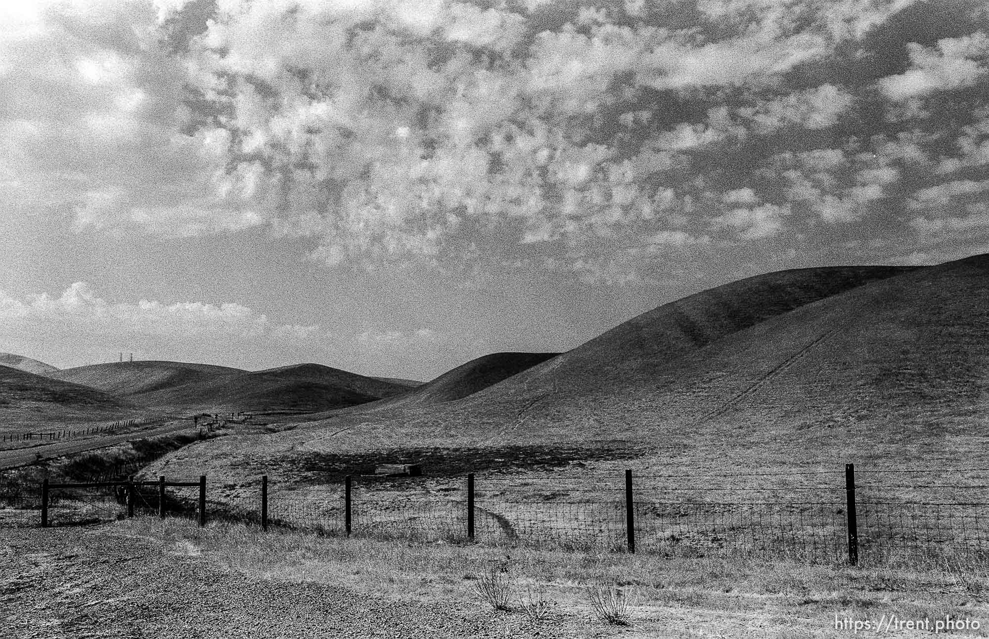 Hills, fence, clouds