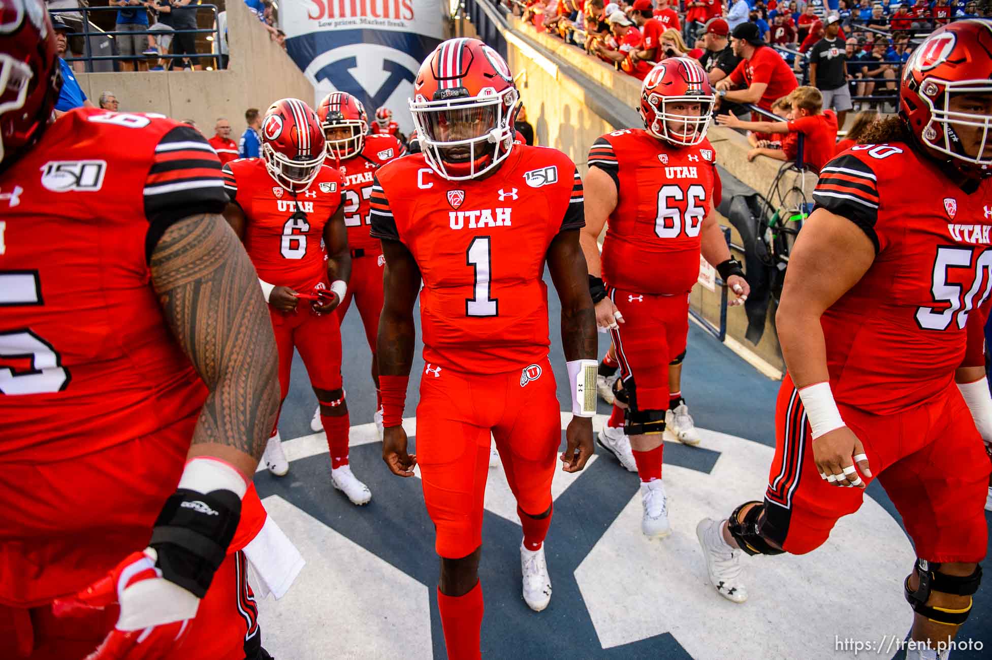 (Trent Nelson  |  The Salt Lake Tribune)  
;Utah Utes quarterback Tyler Huntley (1) enters the stadium as Brigham Young University (BYU) hosts the University of Utah, NCAA football in Provo on Thursday Aug. 29, 2019.