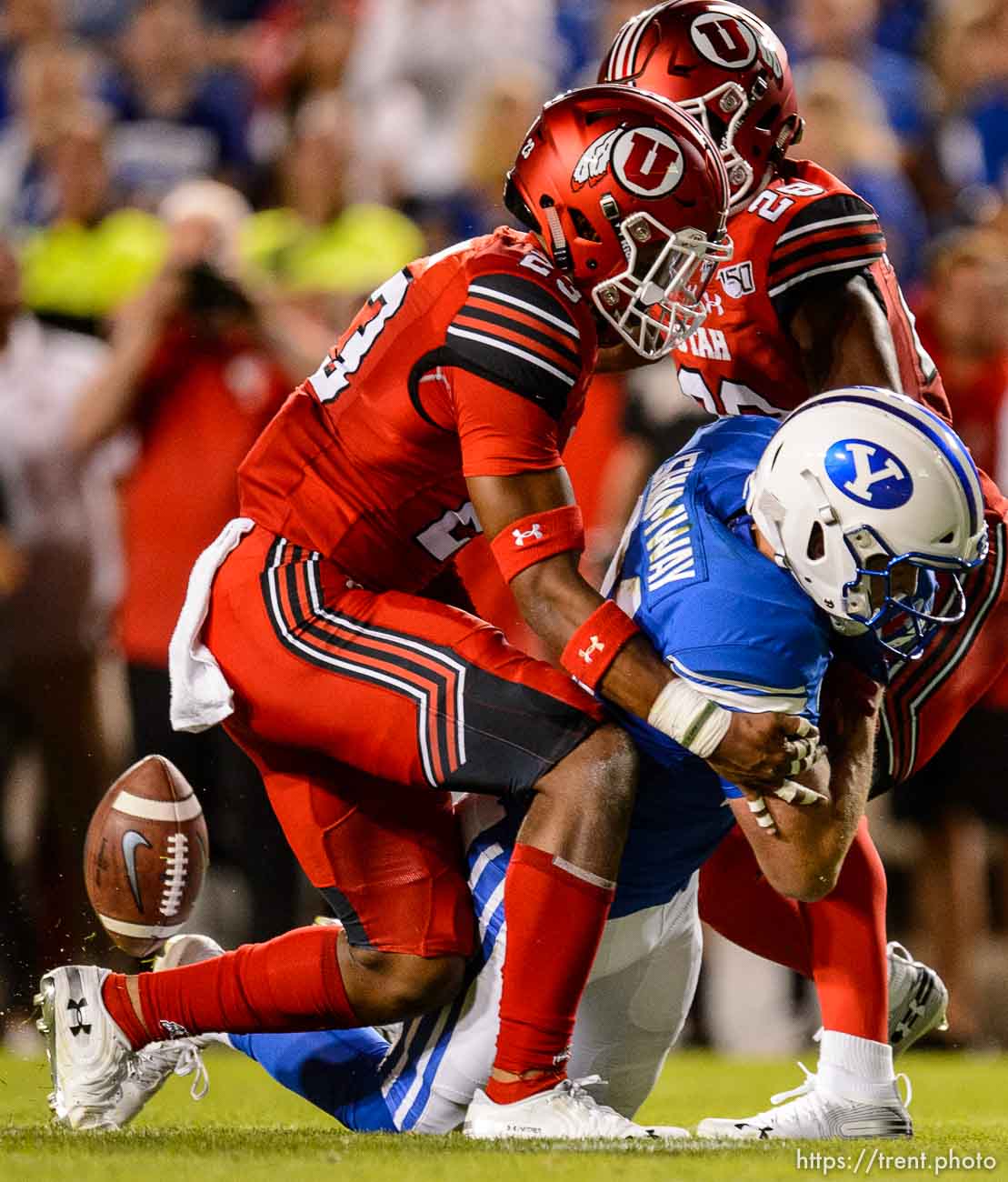 (Trent Nelson  |  The Salt Lake Tribune)  
Utah Utes defensive back Julian Blackmon (23) and Utah Utes defensive back Javelin Guidry (28) knock the ball out of the hands of Brigham Young Cougars wide receiver Talon Shumway (21) as Brigham Young University (BYU) hosts the University of Utah, NCAA football in Provo on Thursday Aug. 29, 2019.