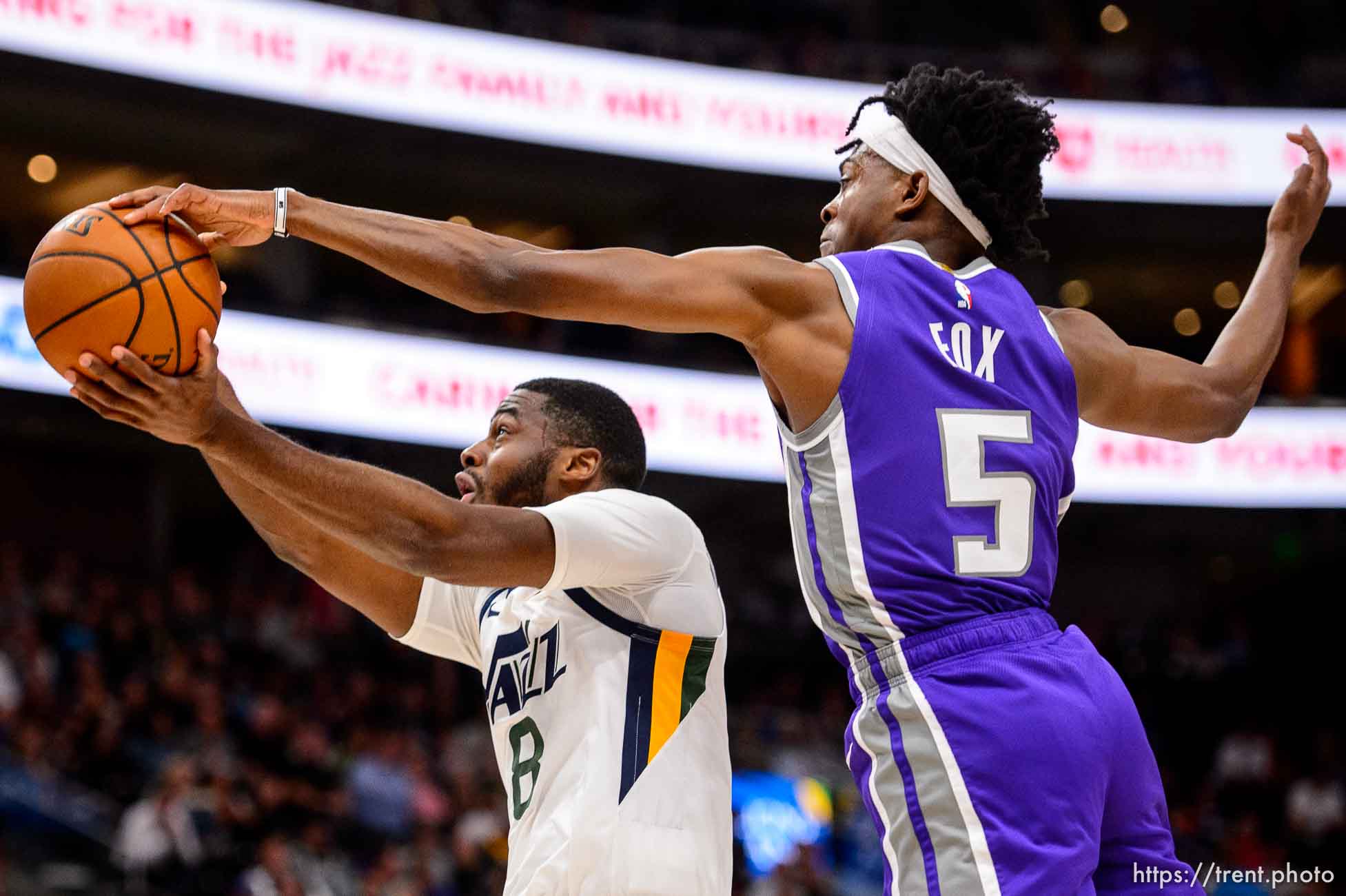 (Trent Nelson  |  The Salt Lake Tribune) 
Utah Jazz guard Emmanuel Mudiay (8) defended by Sacramento Kings guard De'Aaron Fox (5) as the Utah Jazz hosts the Sacramento Kings, NBA basketball in Salt Lake City on Monday Oct. 14, 2019.