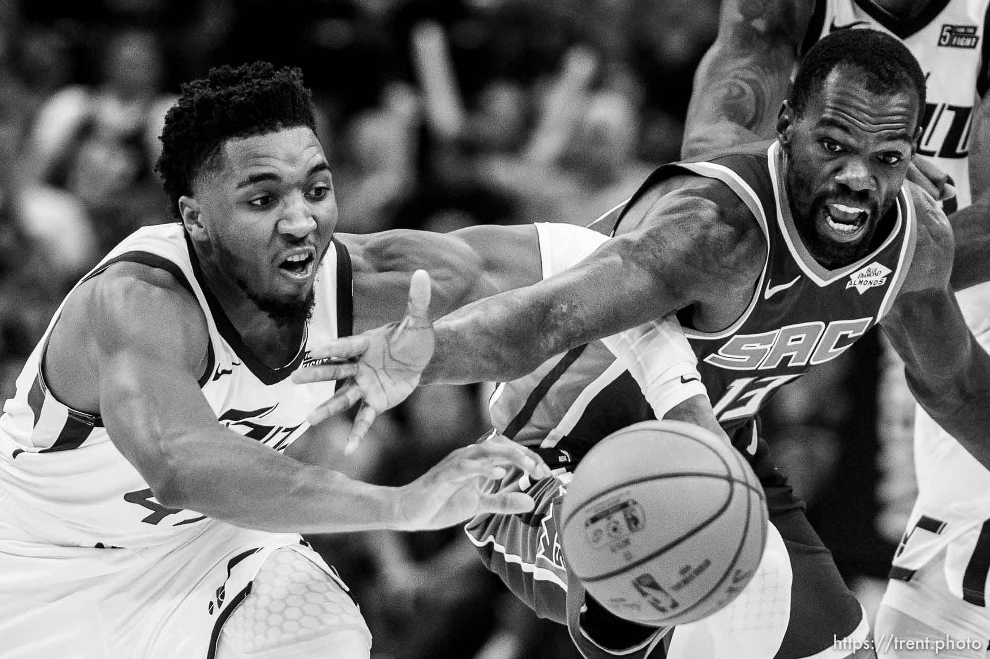 (Trent Nelson  |  The Salt Lake Tribune) 
Utah Jazz guard Donovan Mitchell (45) and Sacramento Kings center Dewayne Dedmon (13) reach for the ball as the Utah Jazz hosts the Sacramento Kings, NBA basketball in Salt Lake City on Monday Oct. 14, 2019.