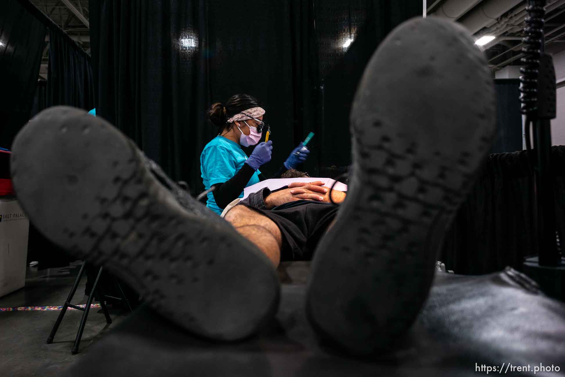 (Trent Nelson  |  The Salt Lake Tribune)
Dental hygienist Erika Castañeda performs dental cleaning at Project Homeless Connect, where community volunteers to provide services for individuals and families experiencing homelessness, at the Salt Palace Convention Center in Salt Lake City on Friday Oct. 25, 2019.