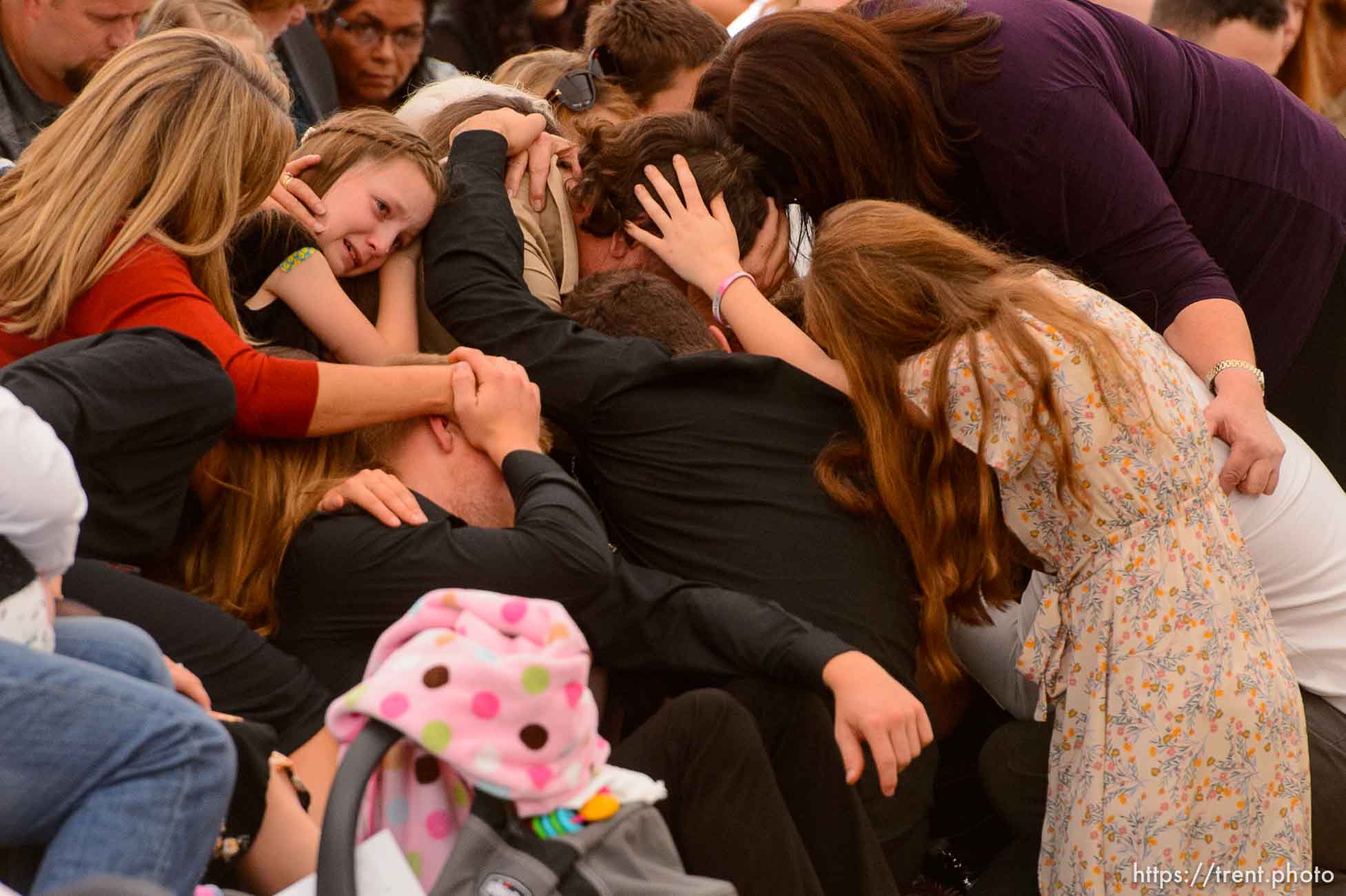(Trent Nelson  |  The Salt Lake Tribune)
David Langford's family embraces each other during the closing hymn at the funeral for Dawna Langford and two of her children, Trevor and Rogan, in La Mora, Sonora on Thursday Nov. 7, 2019.
