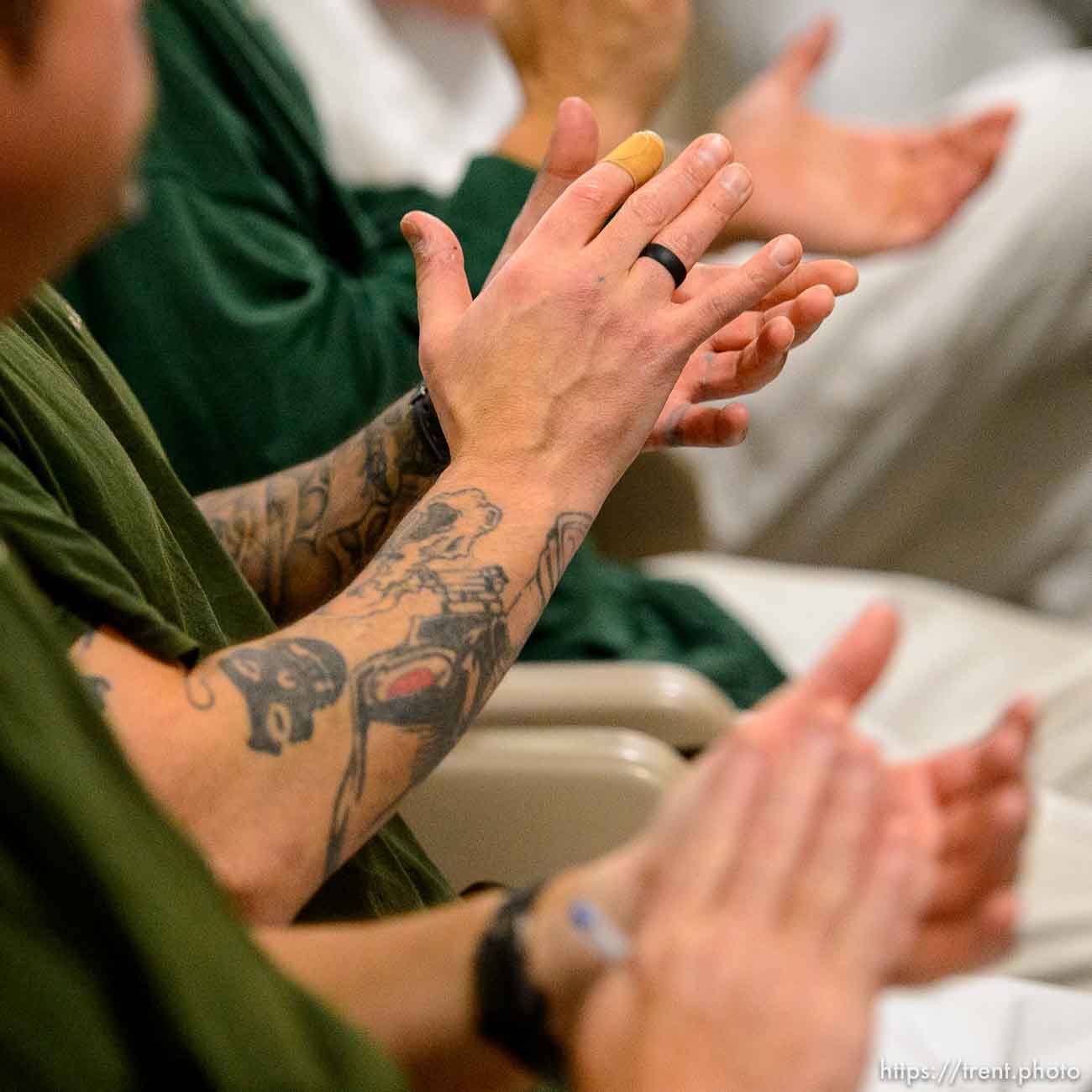 (Trent Nelson  |  The Salt Lake Tribune)
Inmates applaud as Gage King, an inmate at the Utah State Prison, delivers a speech at a meeting of the New Visions Speech Club in the prison's Promontory facility in Draper on Tuesday Dec. 3, 2019.