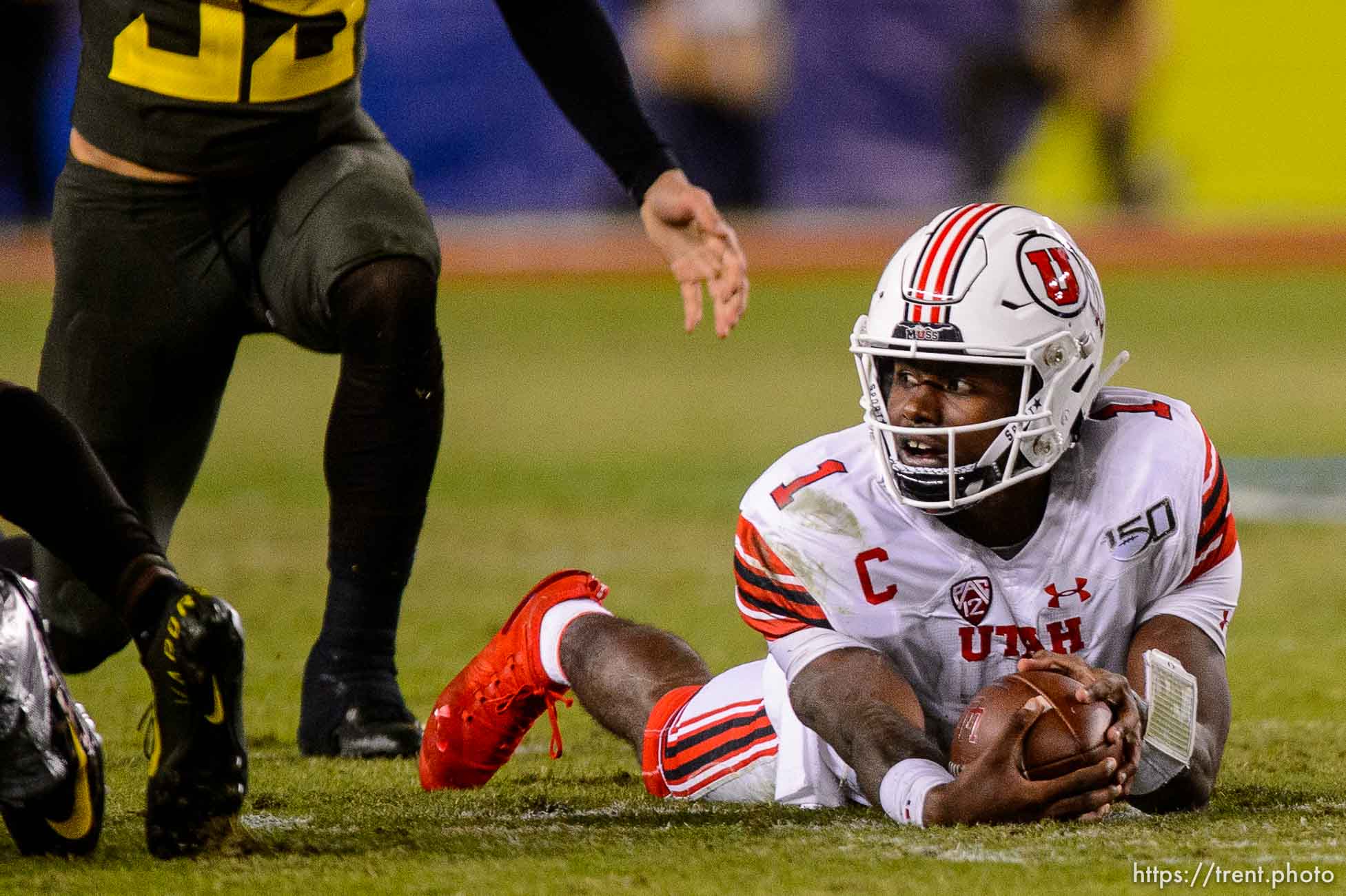 (Trent Nelson  |  The Salt Lake Tribune)
Utah Utes quarterback Tyler Huntley (1) after a run as Utah faces Oregon in the Pac-12 football championship game in Santa Clara, Calif., on Friday Dec. 6, 2019.