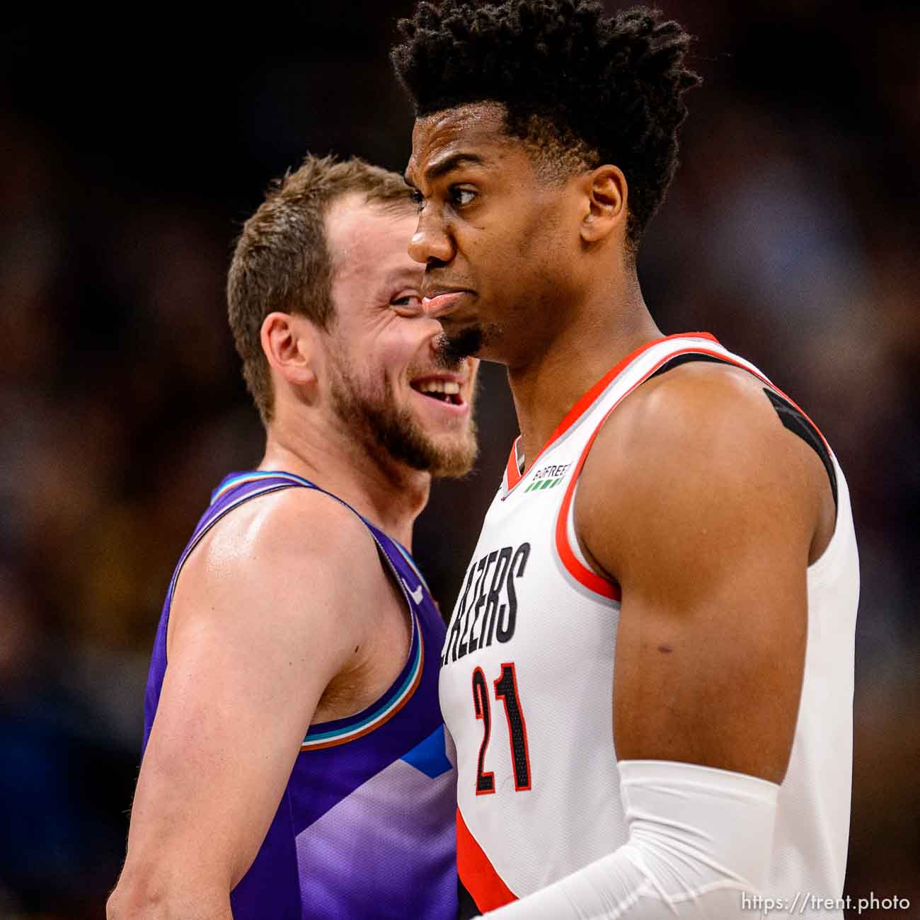 (Trent Nelson  |  The Salt Lake Tribune) Utah Jazz forward Joe Ingles (2) smiles toward Portland Trail Blazers center Hassan Whiteside (21) after being called for a technical foul as the Utah Jazz host the Portland Trail Blazers, NBA basketball in Salt Lake City on Thursday, Dec. 26, 2019.